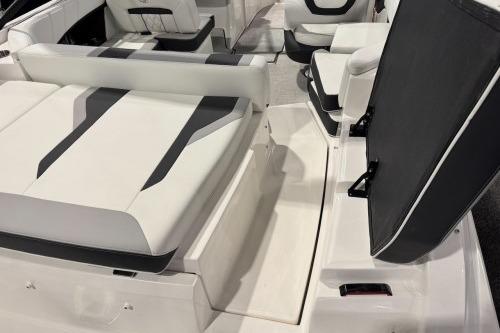 2026 Regal 21 OBX boat interior with sleek white and black seating design.
