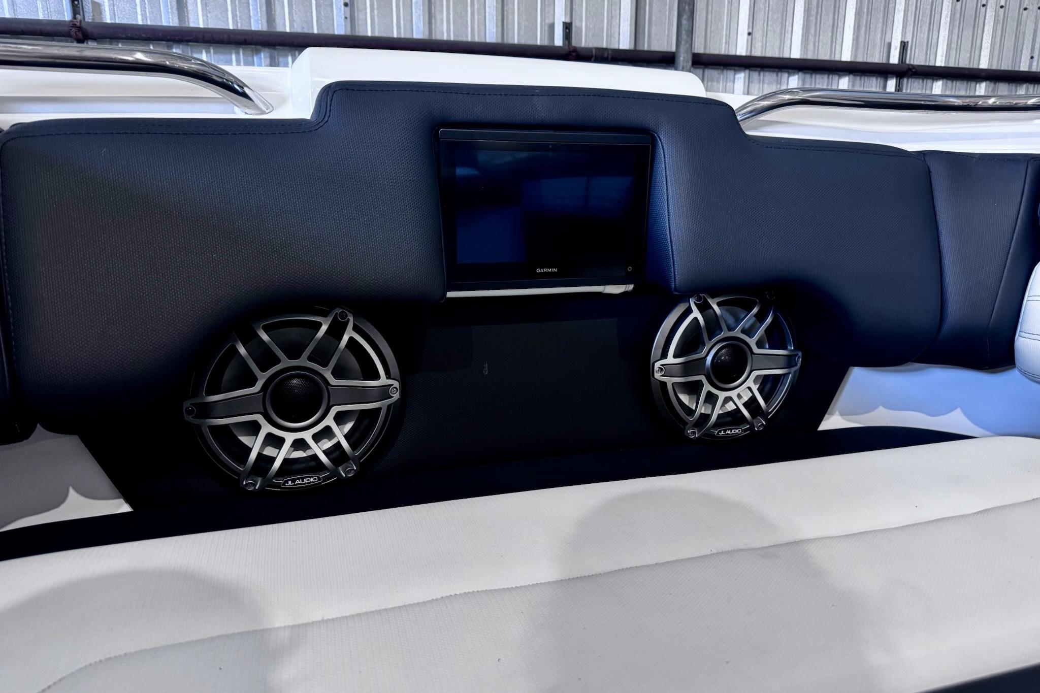 Interior of 2025 Cigarette 42' Auroris with speakers and screen.