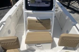 2023 Trophy T24 CC boat interior with beige seating and modern design.