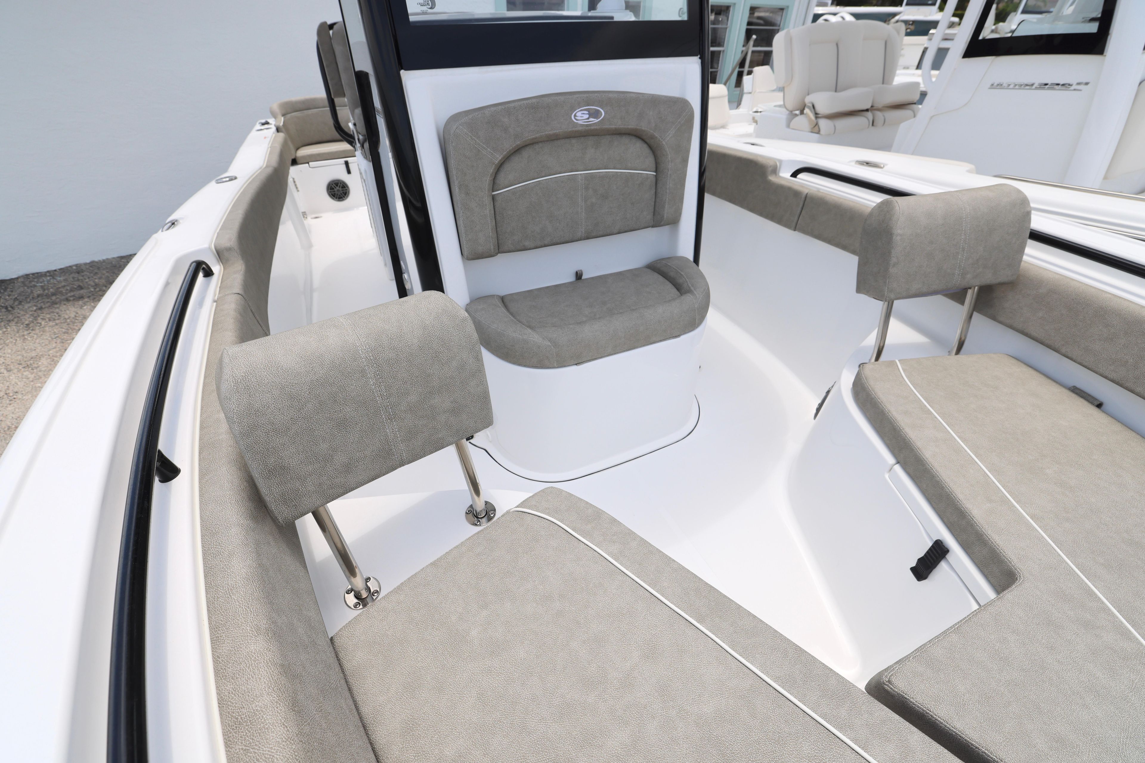 2026 Sea Hunt Ultra 245 SE boat interior with cushioned seating and sleek design.