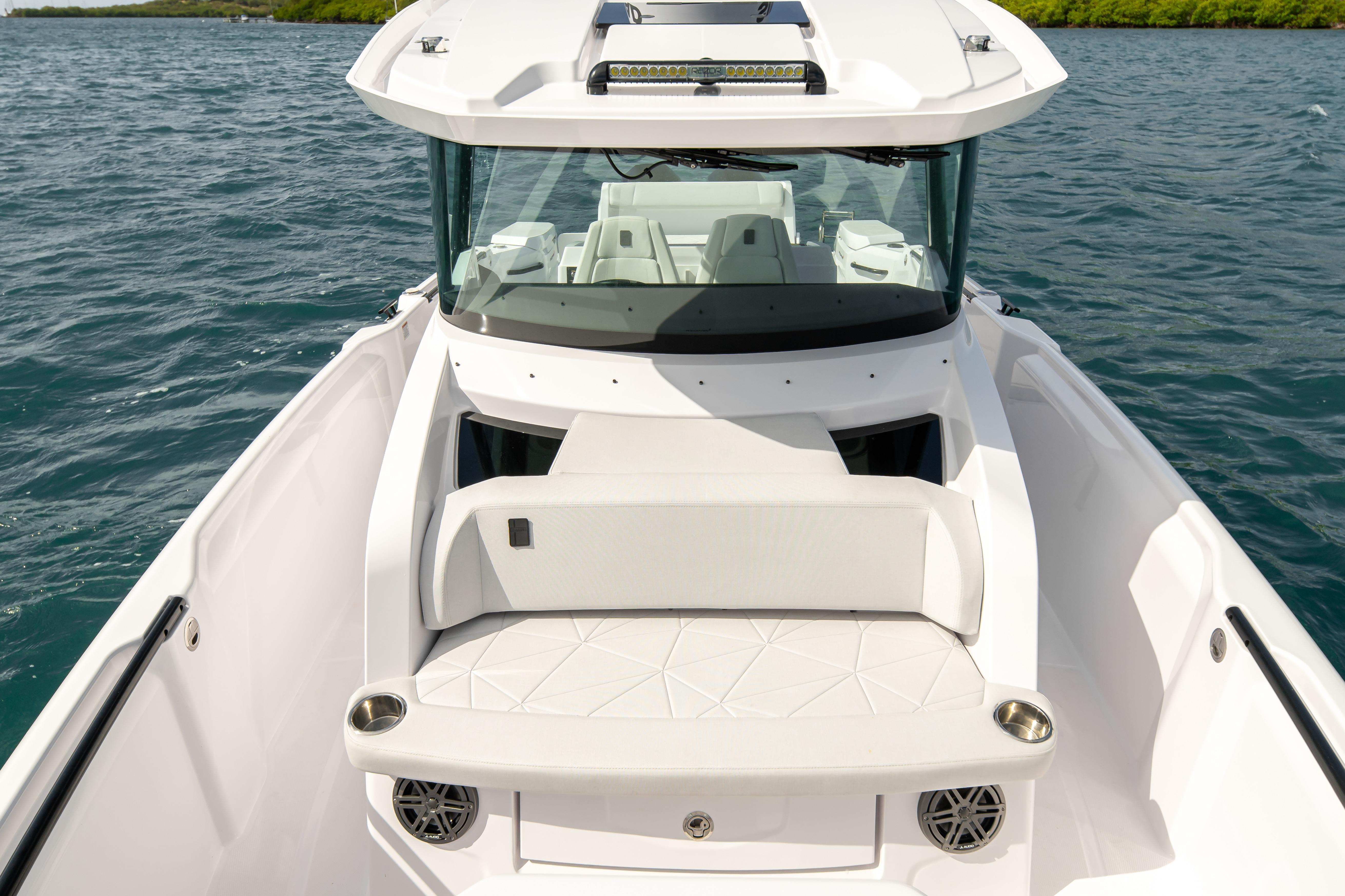 2025 Axopar 29 CCX boat with sleek white design on open water.