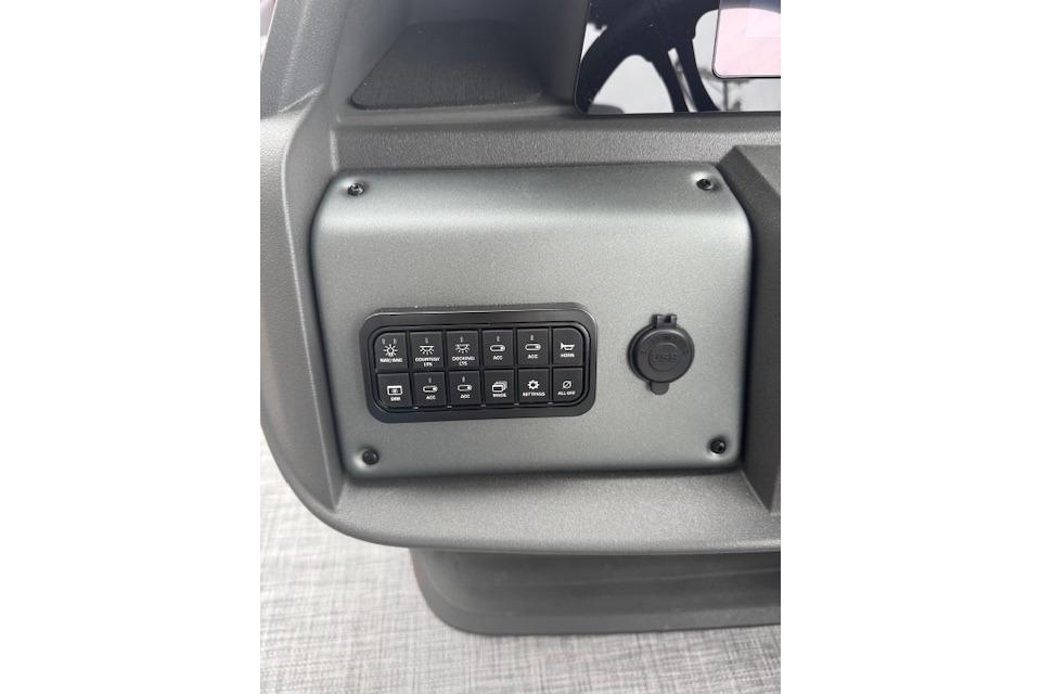 Control panel of 2026 Sun Tracker Party Barge 22 DLX pontoon boat.