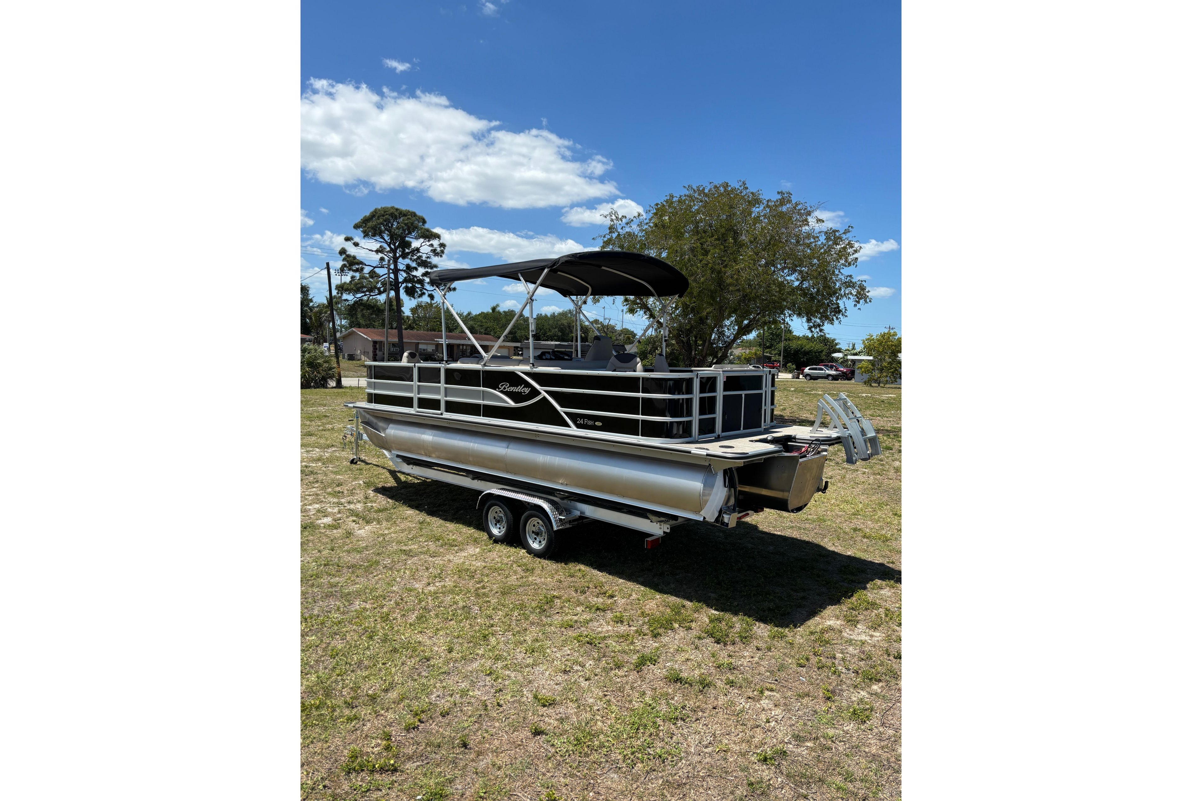 2026 Bentley Pontoons Fish 243 4-Point on trailer outdoors.