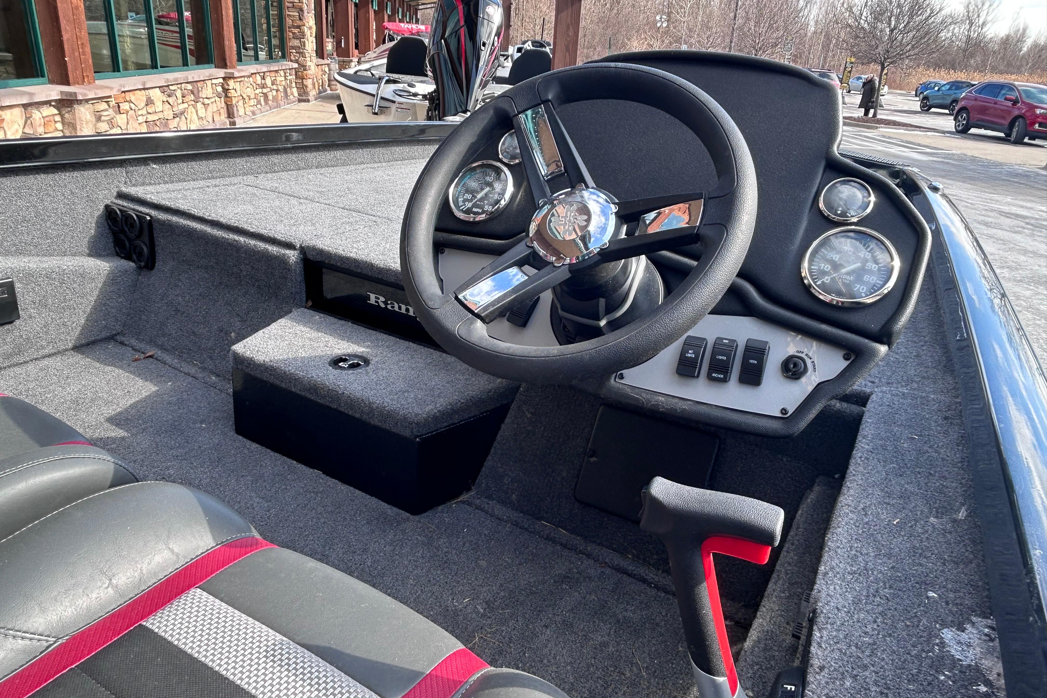 2025 Ranger RT198P boat interior with steering wheel and dashboard controls.