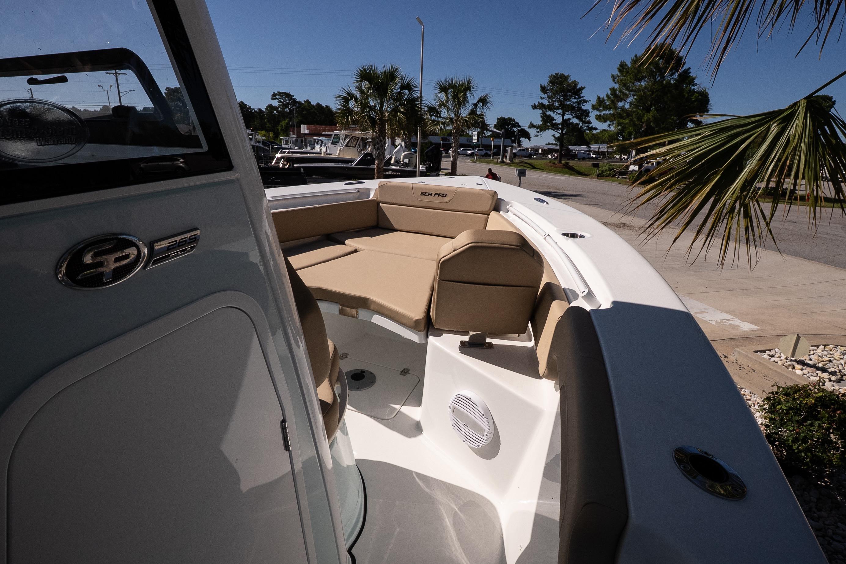 2026 Sea Pro 265FLX Sandbar boat with tan seating and sleek design.