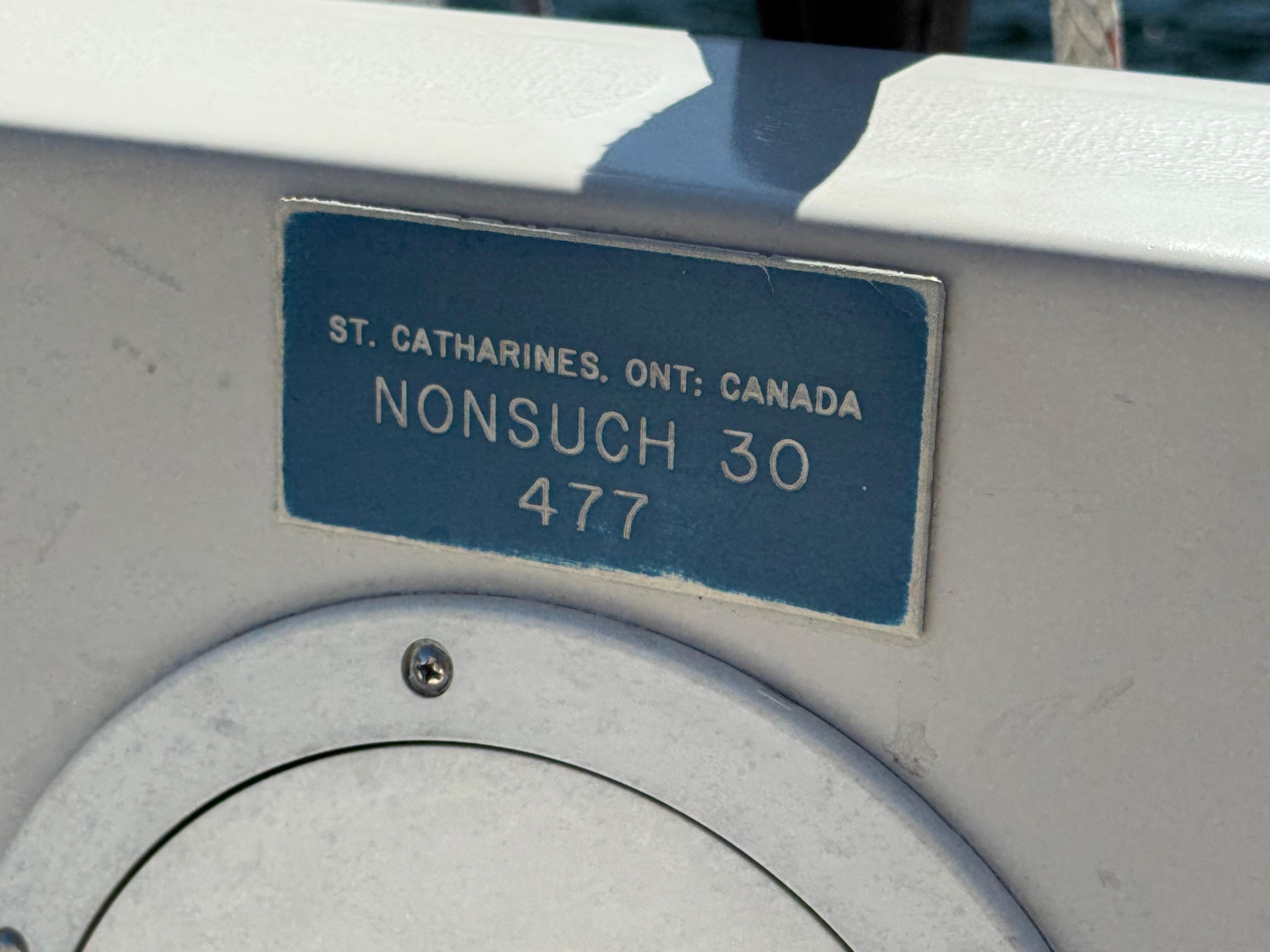 Plaque on 1989 Nonsuch 30 Ultra sailboat, St. Catharines, Ontario, Canada.
