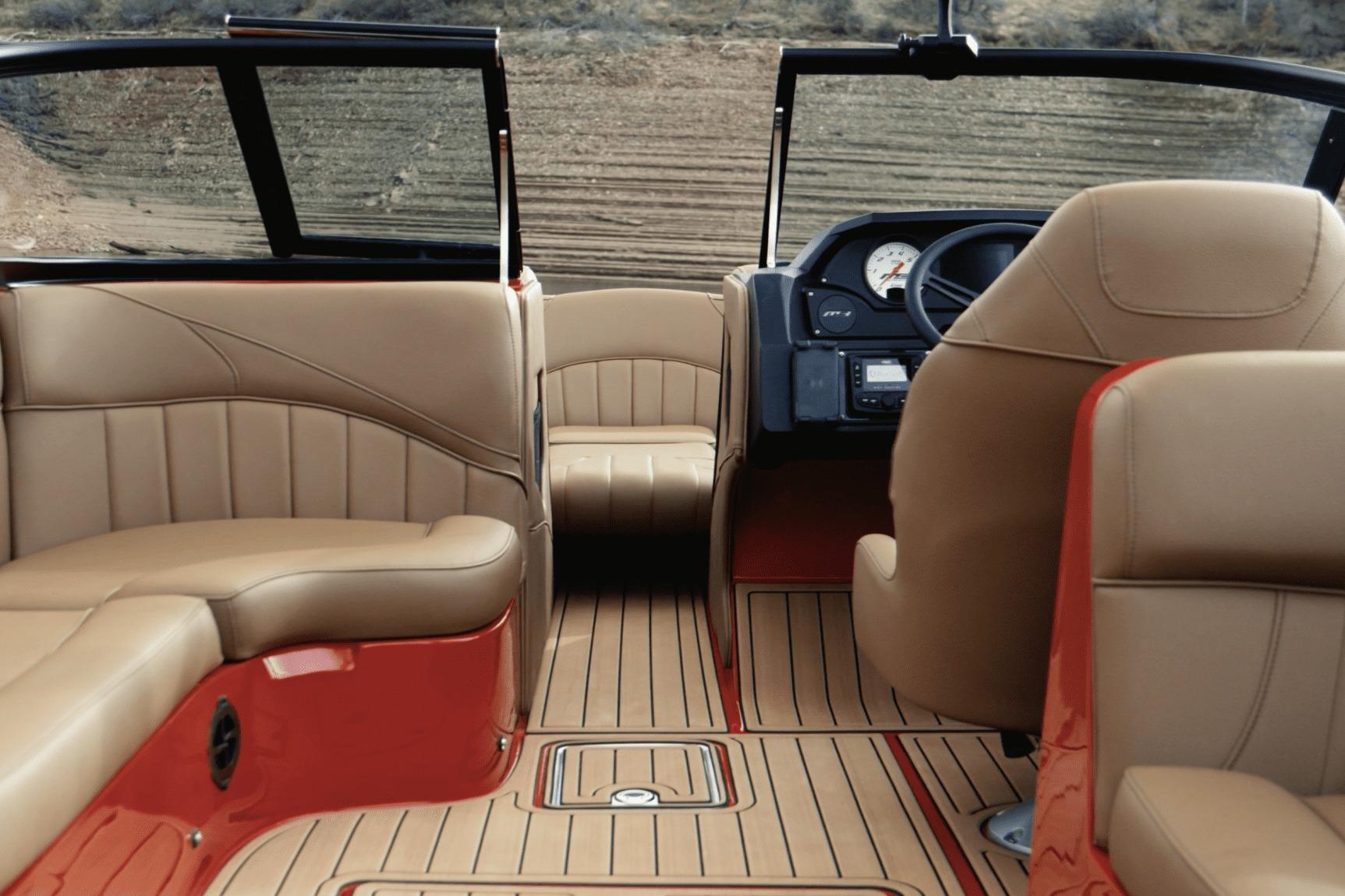 Interior of 2027 MB B52 23 Classic boat with tan leather seating and modern dashboard.