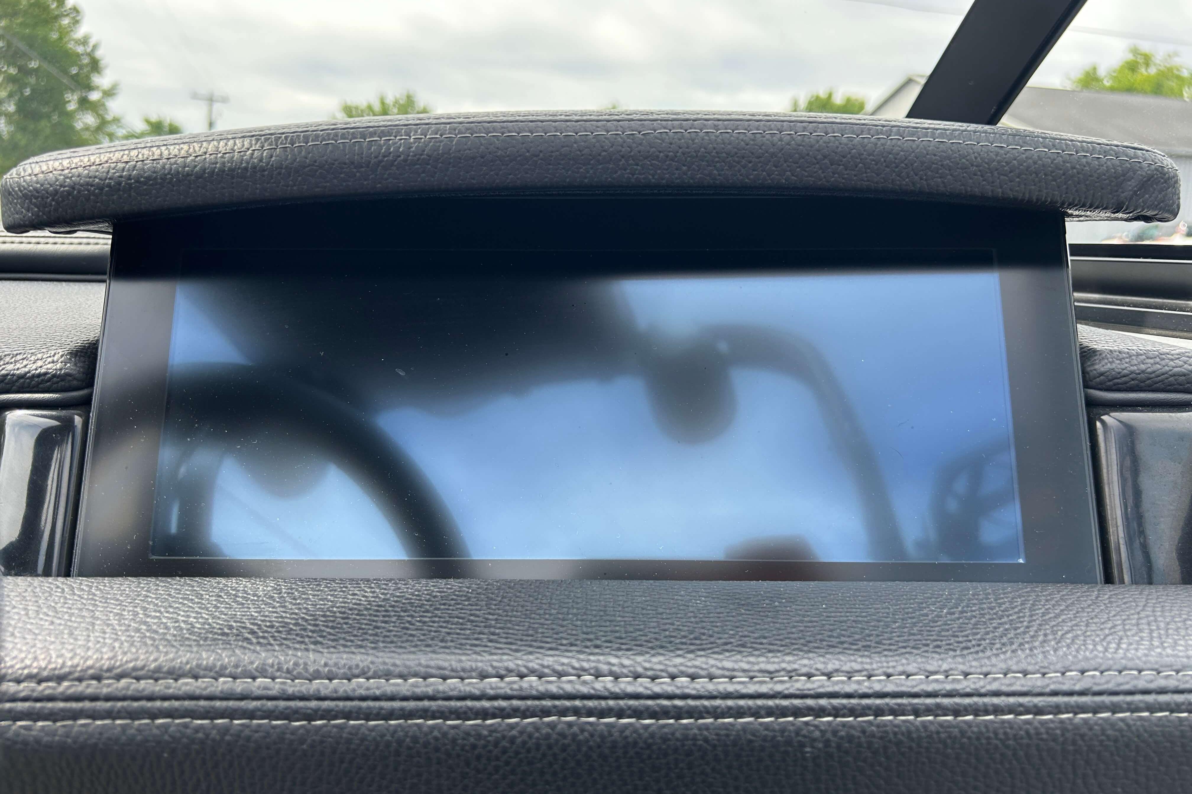 2021 Nautique Super Air Nautique GS24 dashboard screen with leather trim.