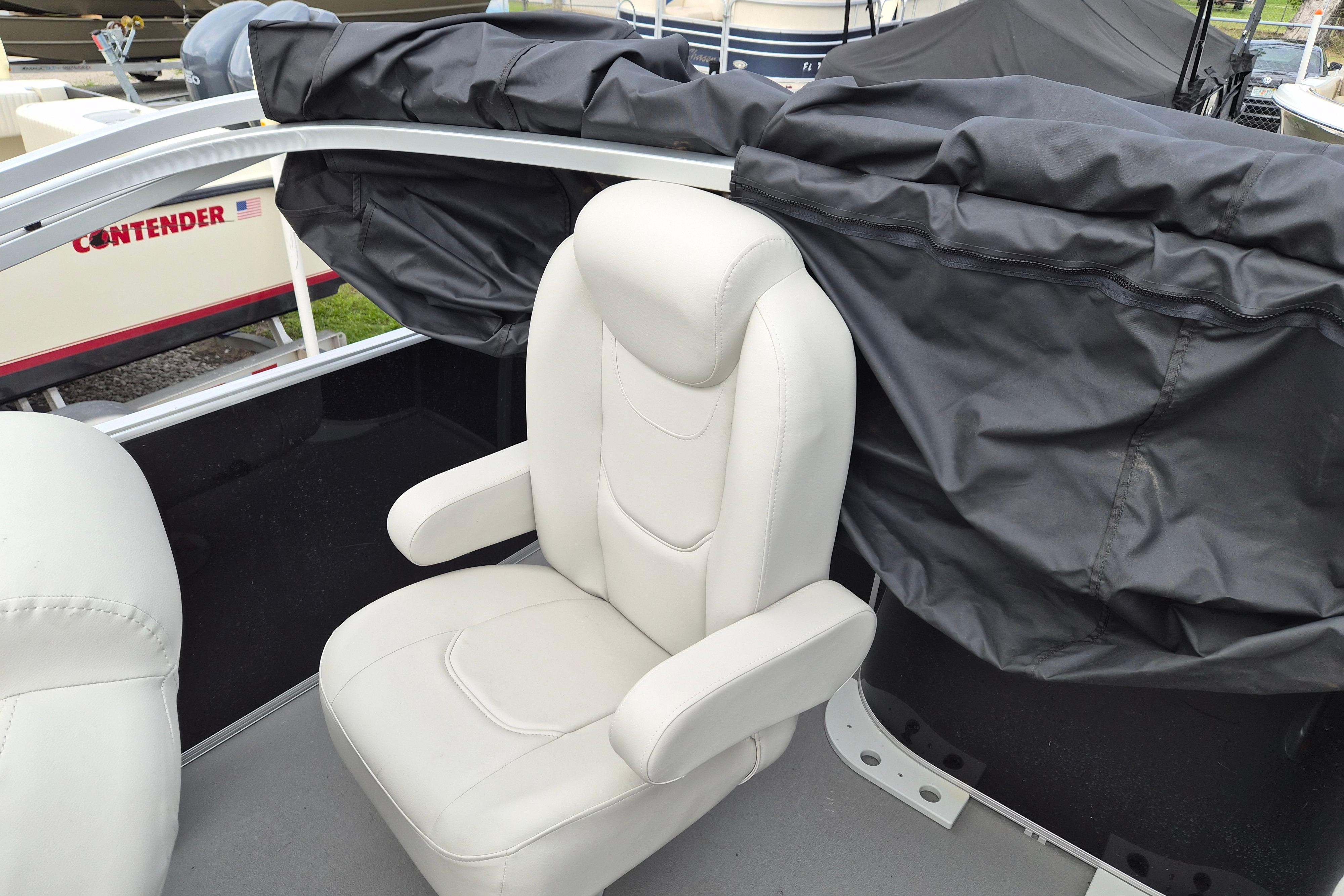 White captain's chair on 2025 Sylvan Mirage Fish 8522 Party Fish boat.