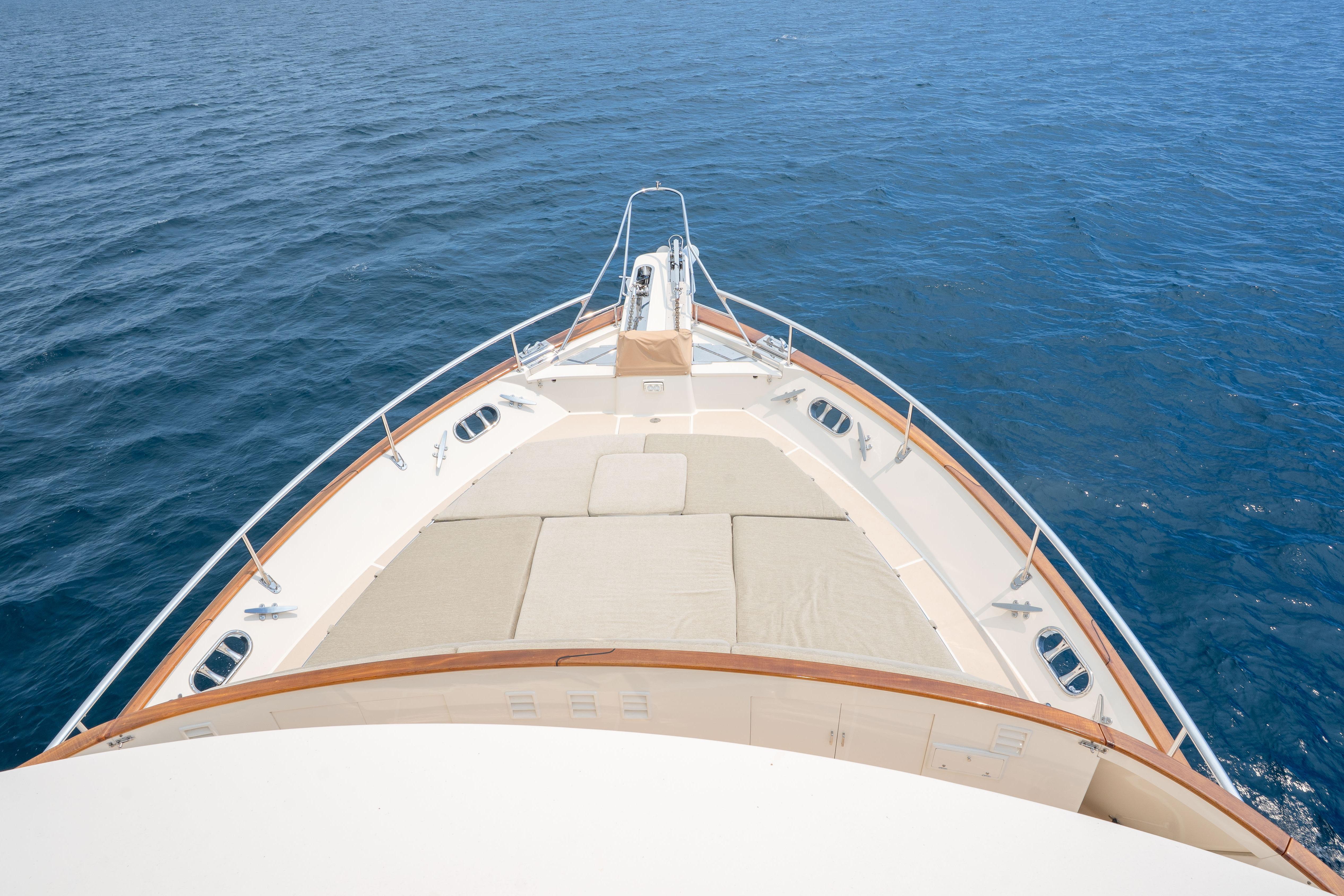 Bow view of 2006 Fleming 75 yacht cruising on open sea.
