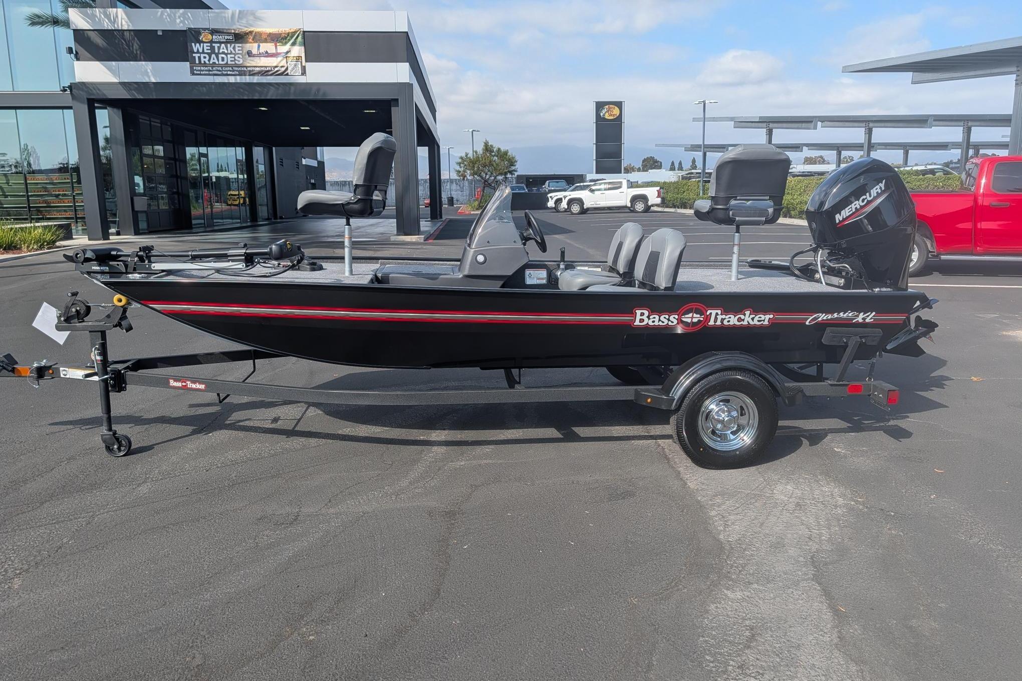 2026 Tracker Bass Tracker Classic XL boat on trailer, parked outdoors.