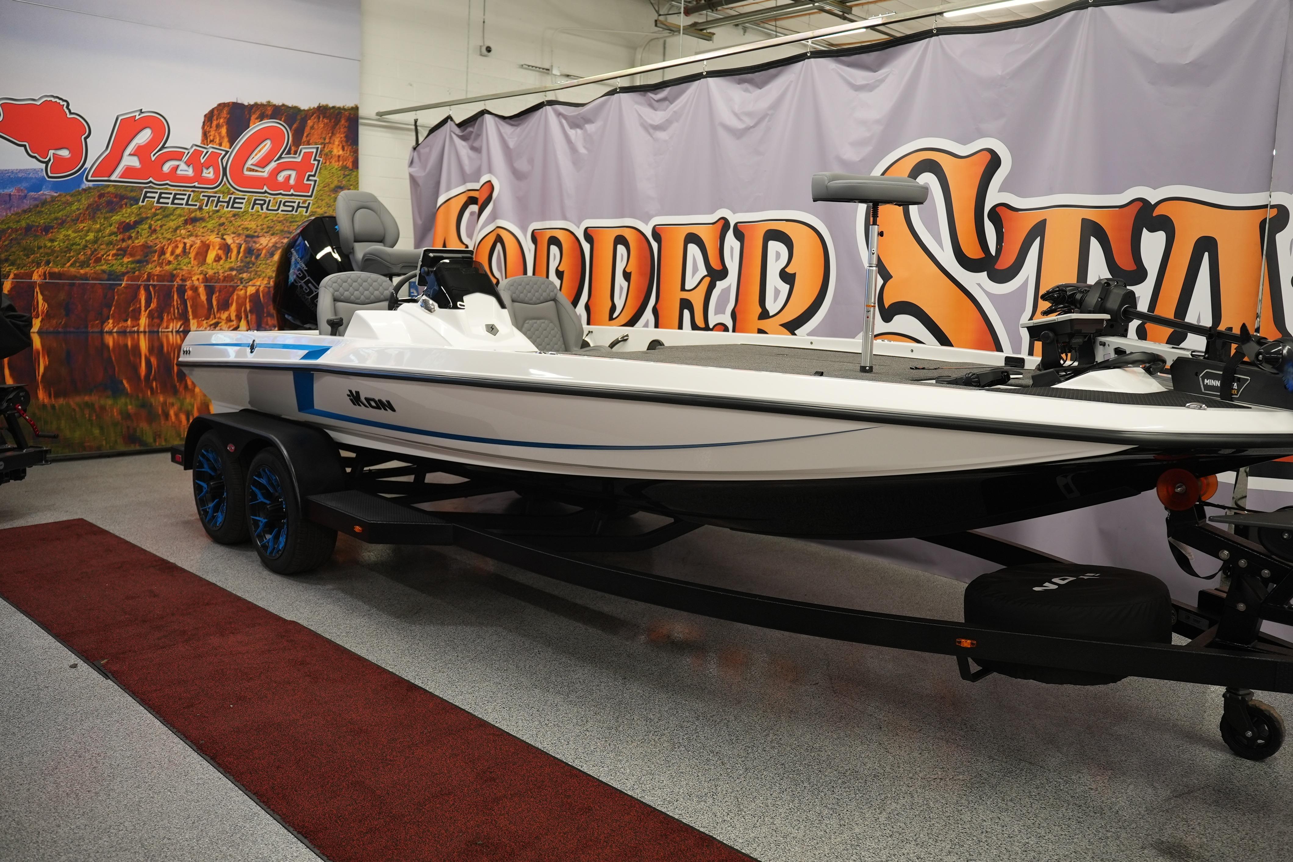 2026 iKon VLE21 boat displayed indoors with promotional backdrop.