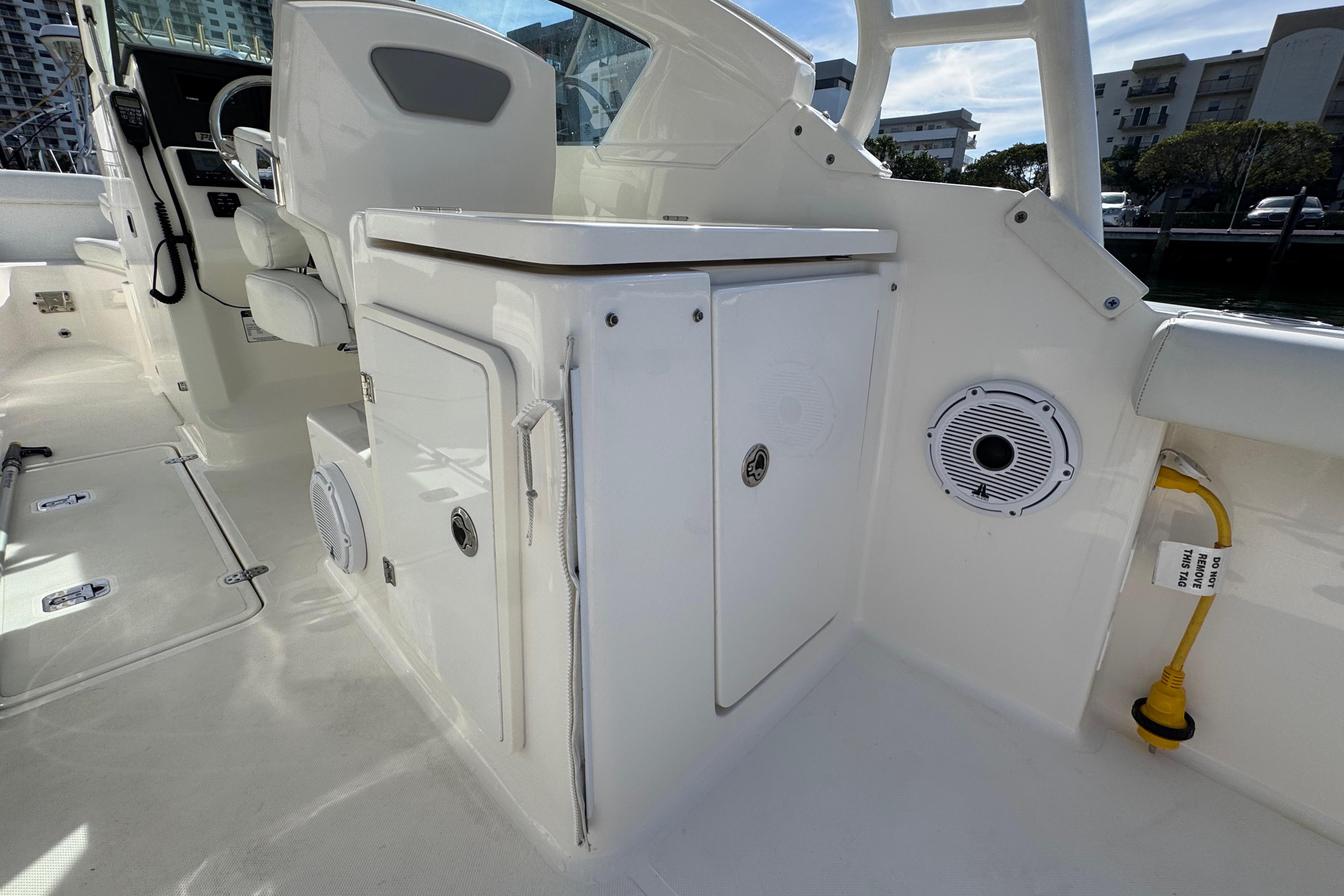 2022 Pursuit DC 266 Dual Console interior with seating and storage compartments.