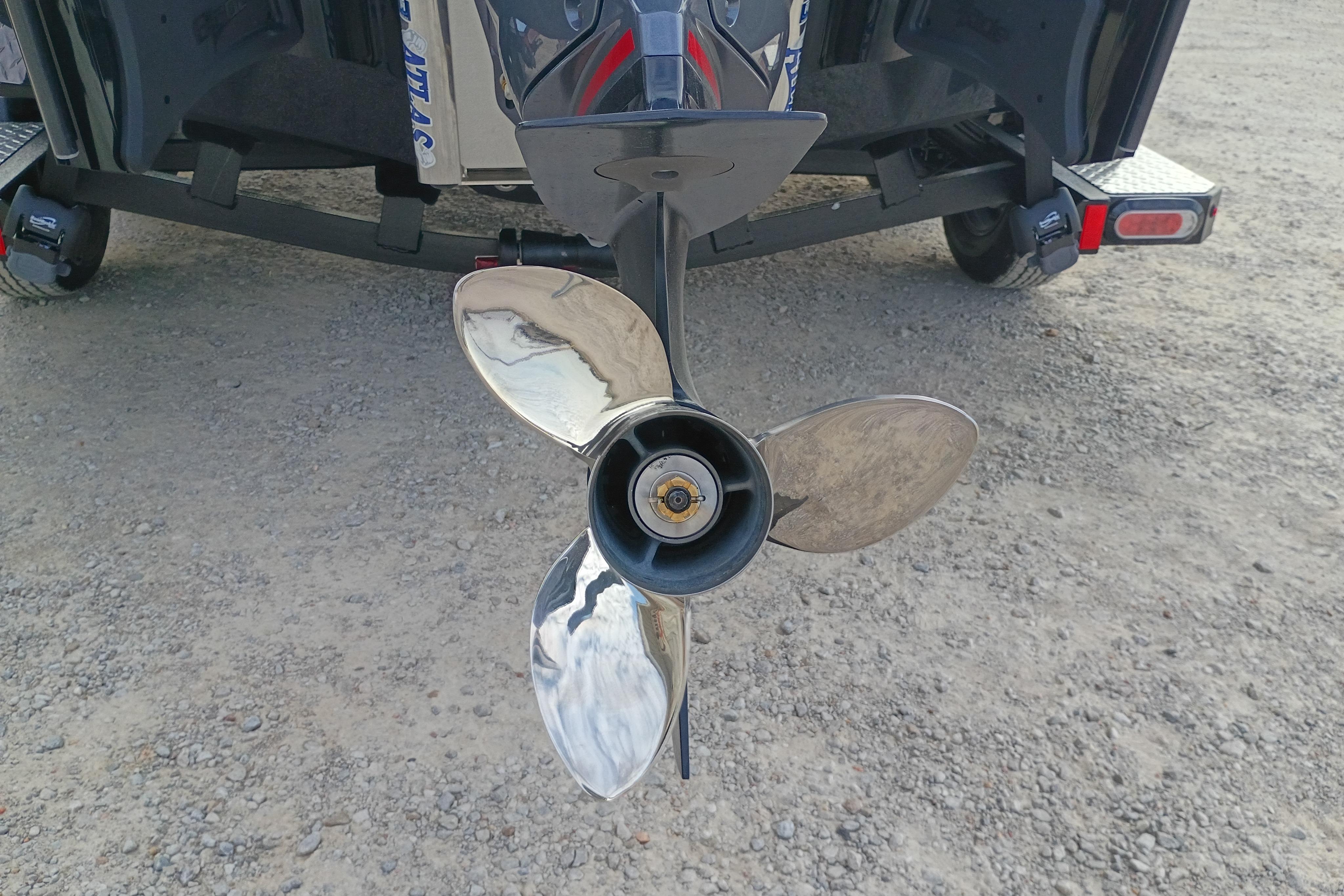 2026 Phoenix 921 ELITEX boat propeller on a trailer, showcasing shiny metal blades.
