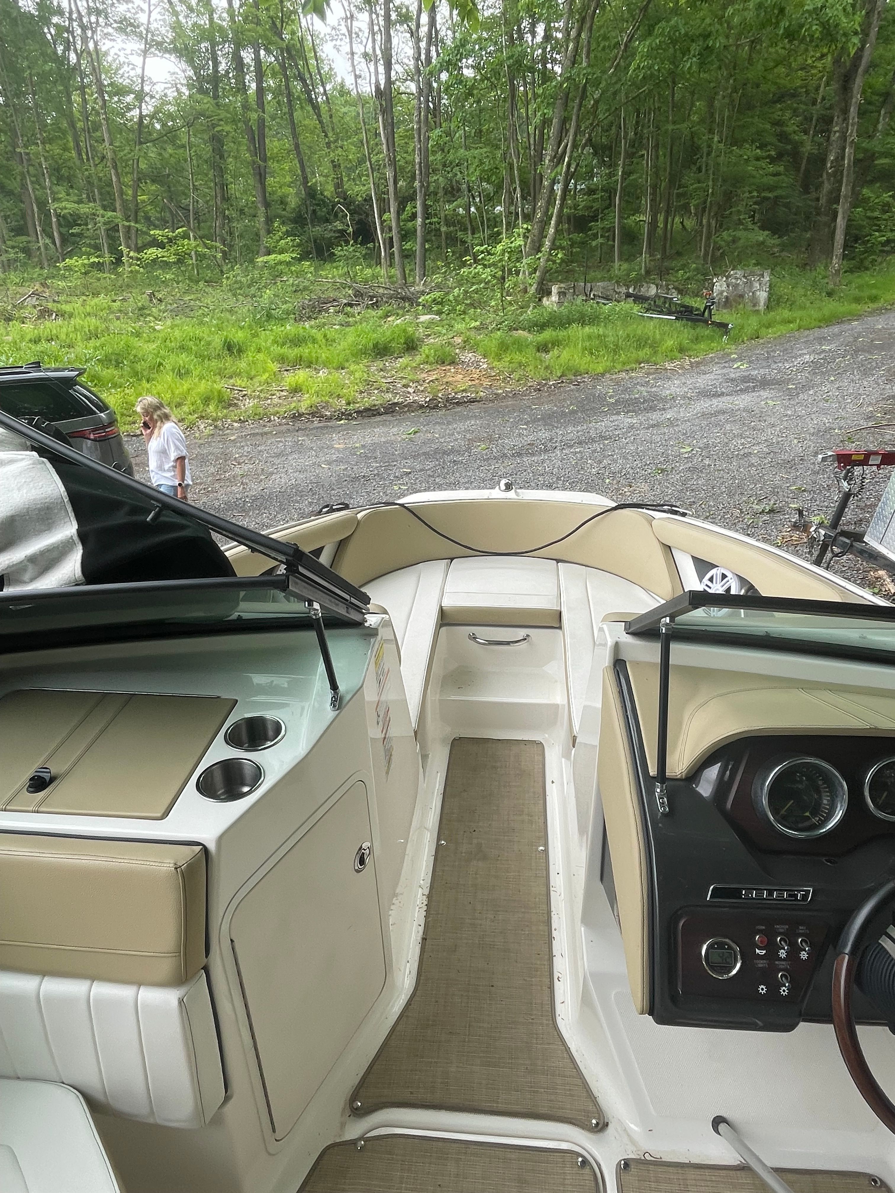 Interior view of a 2016 Sea Ray 21 SPX boat on land.