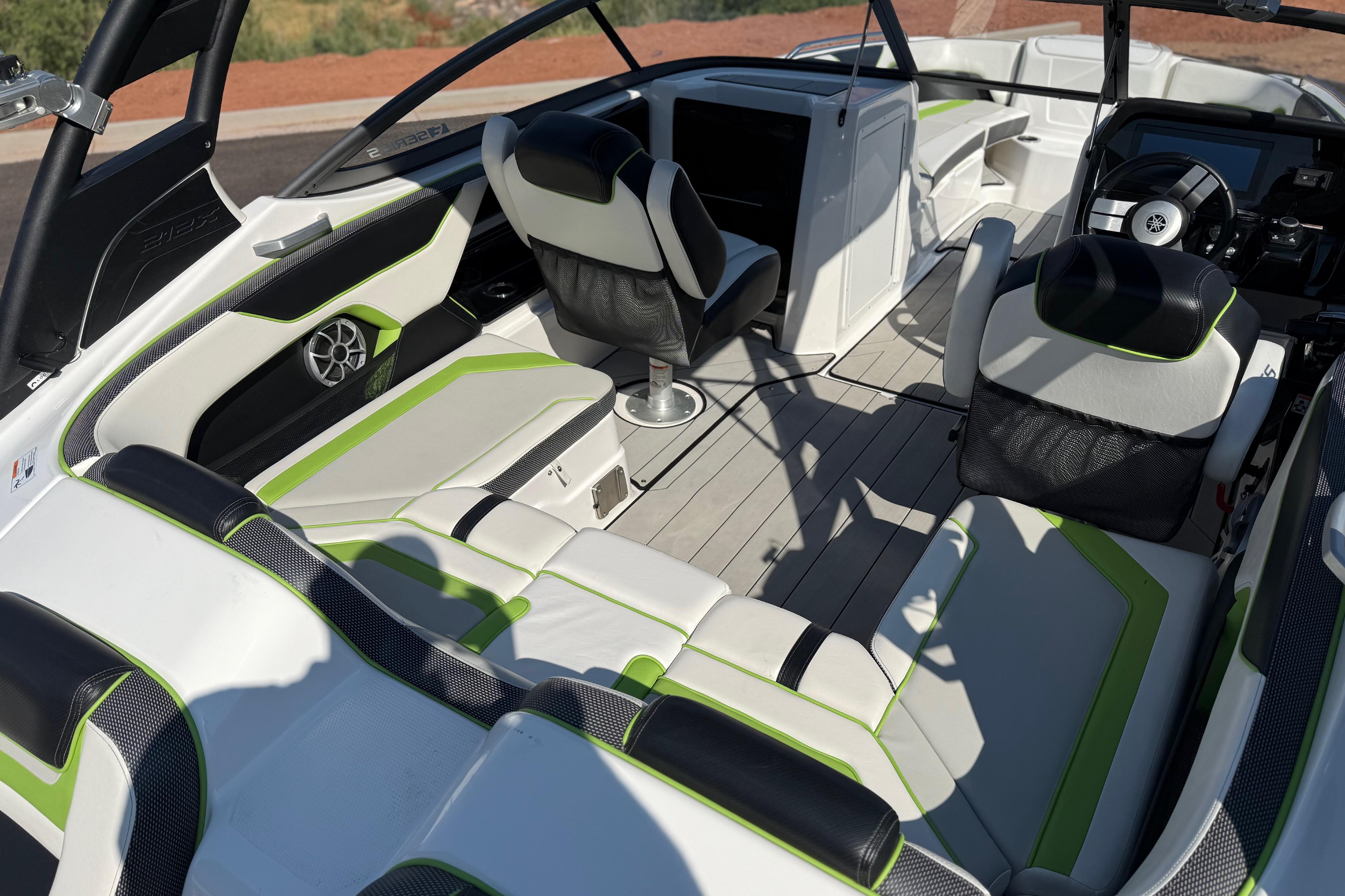 2022 Yamaha Boats 212XE interior with modern seating and sleek design.