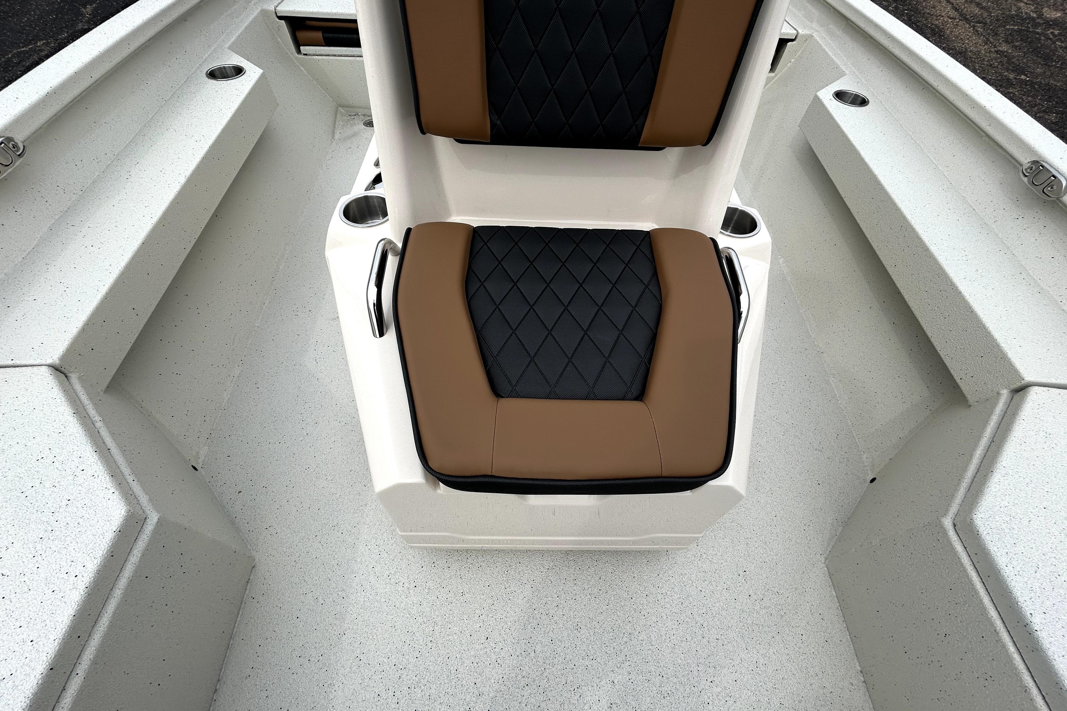 2026 Xpress H20B Bay boat interior with cushioned seating and cup holders.