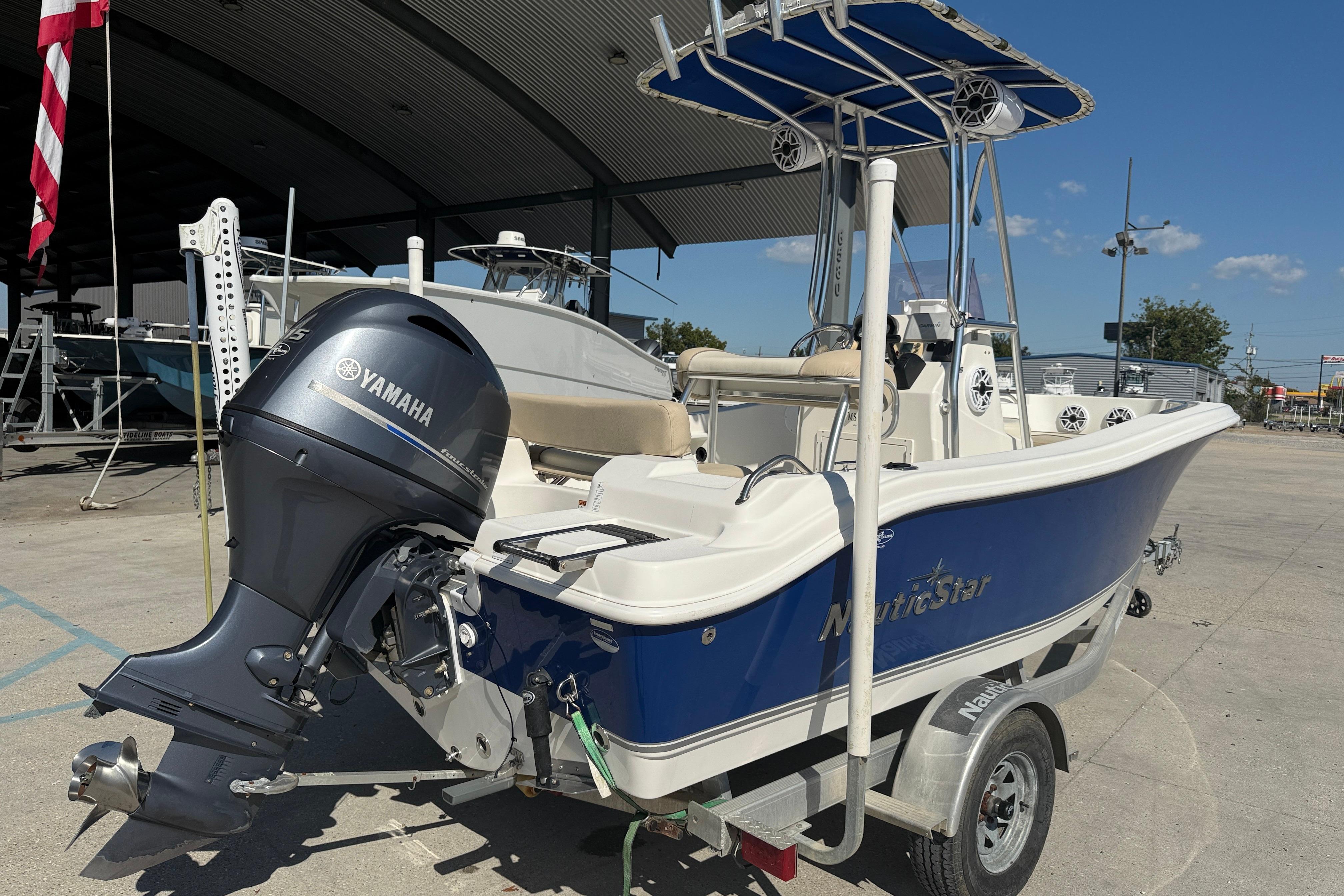 2019 NauticStar 19 XS boat with Yamaha outboard motor on trailer.