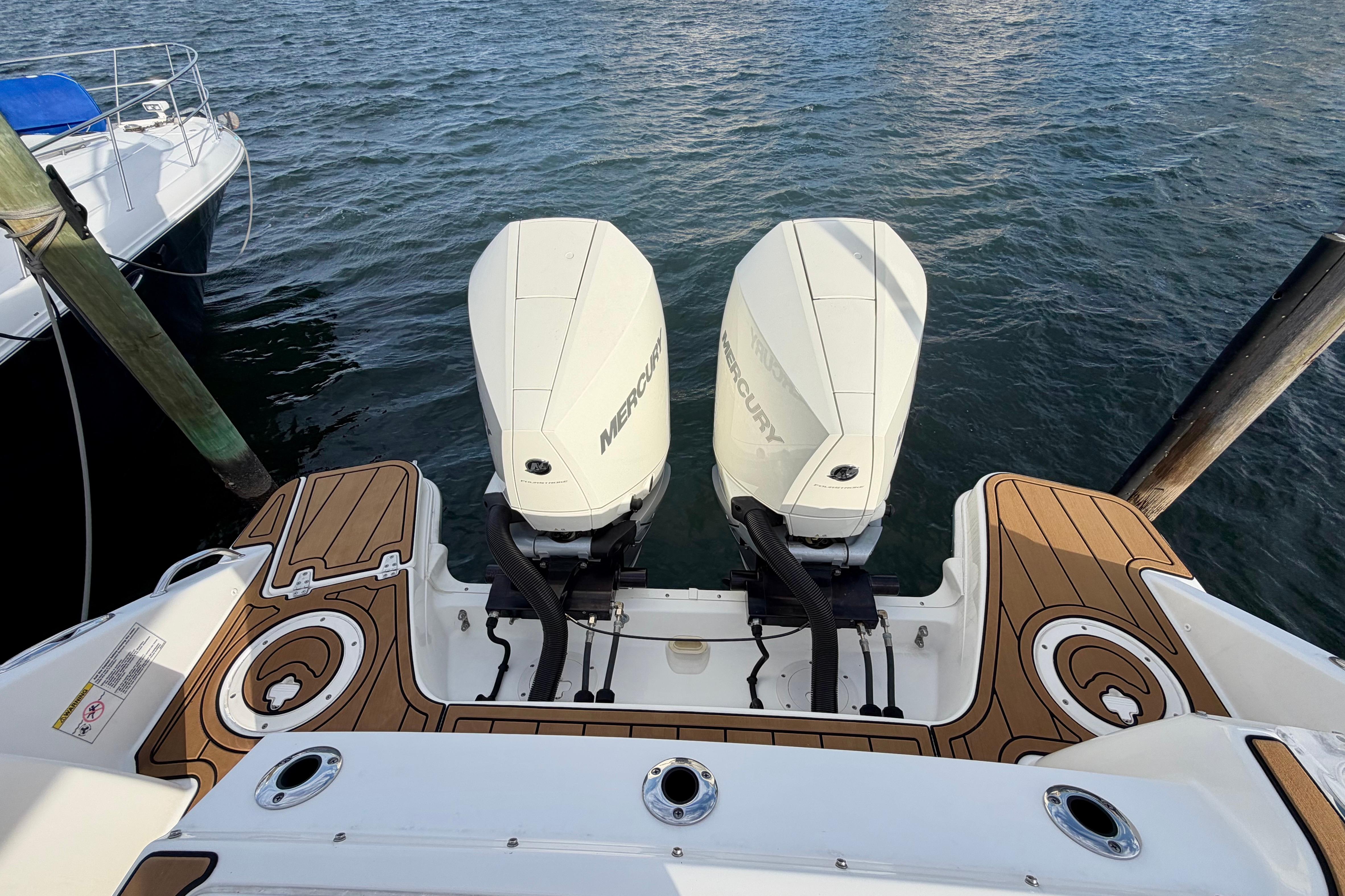 2022 Boston Whaler 280 Vantage with twin Mercury outboard engines on water.
