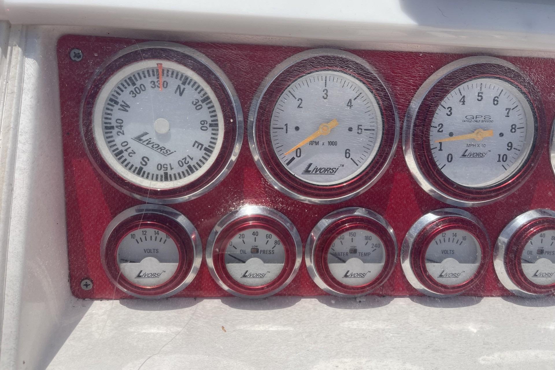 Dashboard of a 2006 Sonic 386 boat with Livorsi gauges.