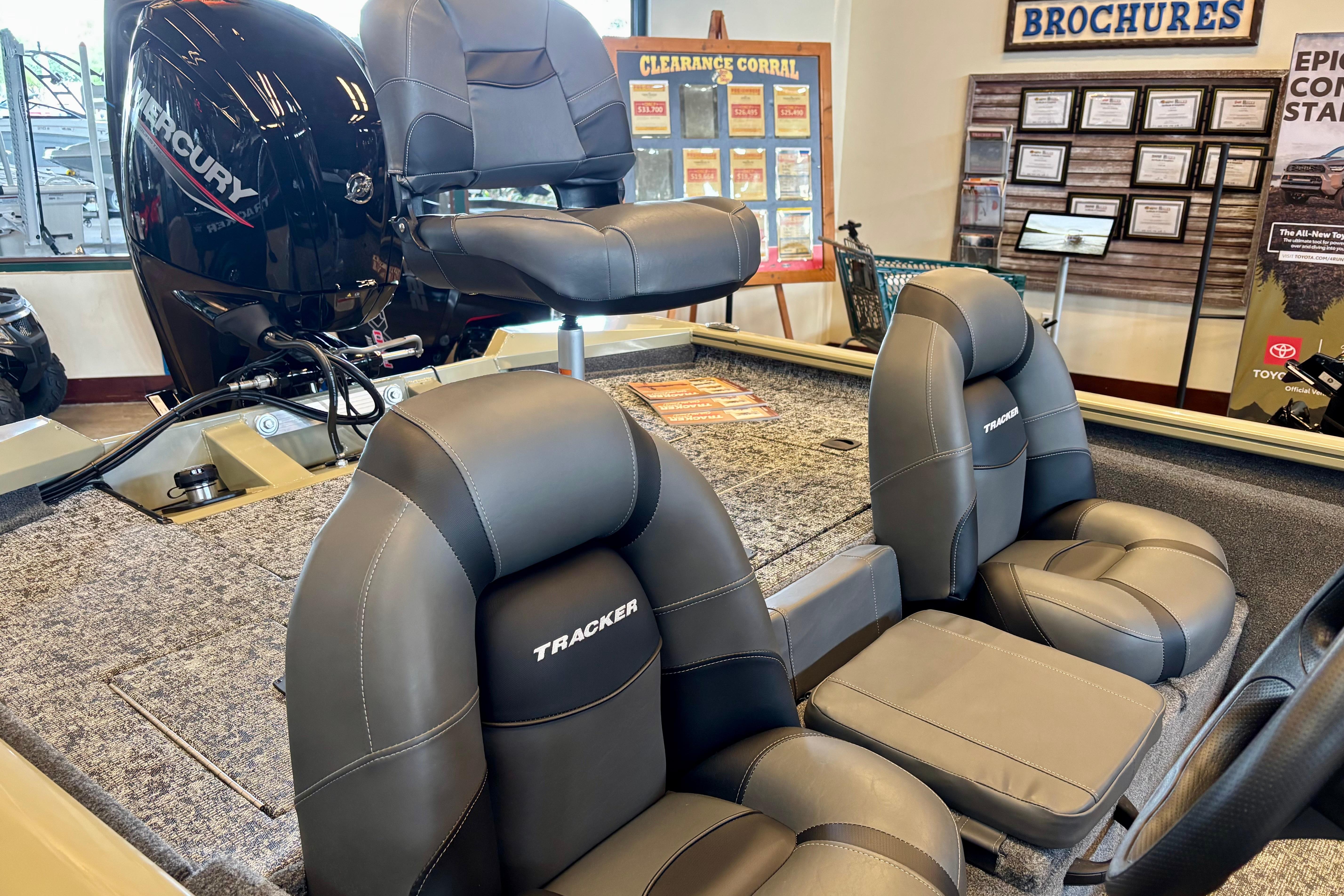 2026 Tracker Pro Team 175 boat interior with Mercury engine, showroom display.