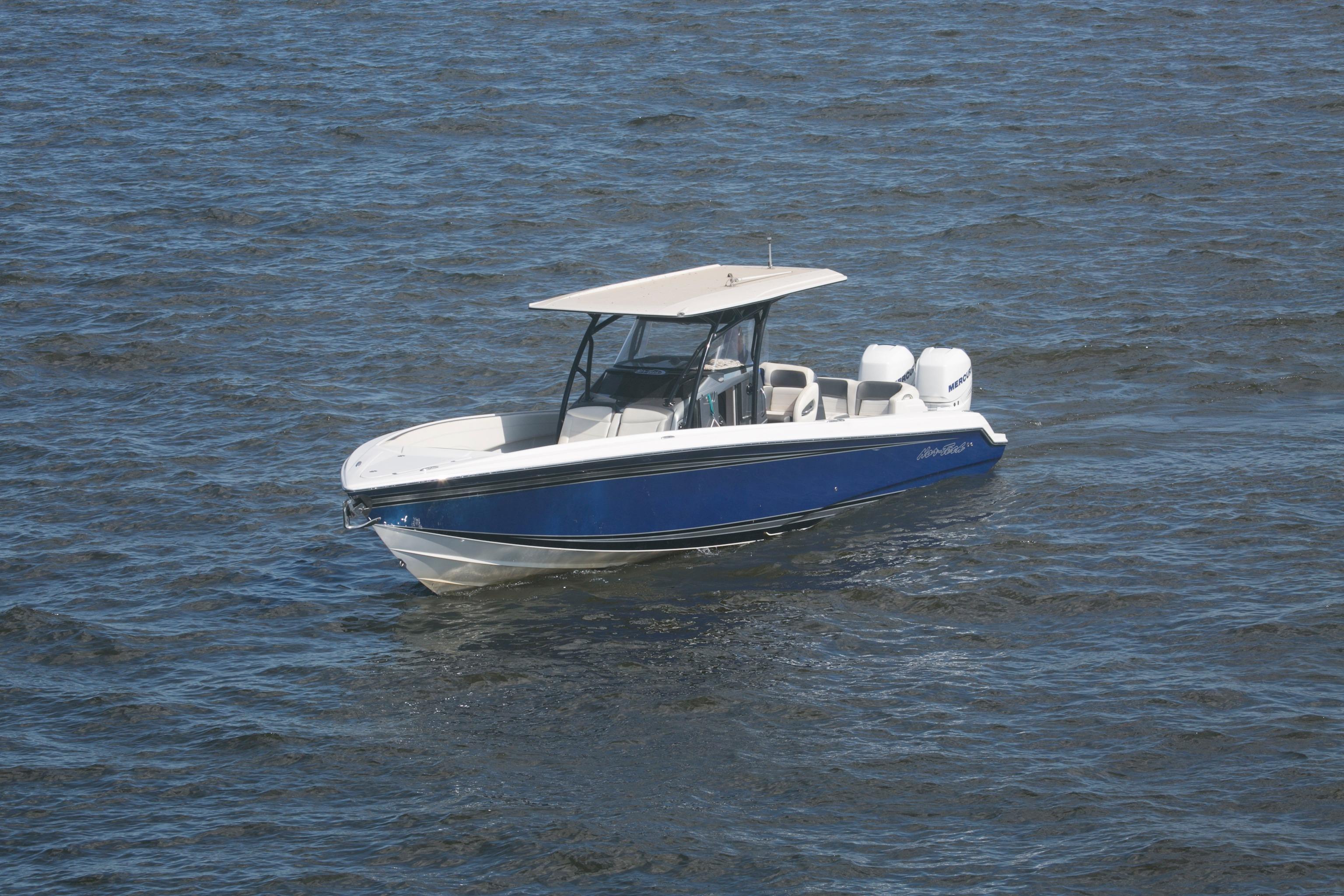 2018 Nor-Tech 340 Sport Center Console boat on open water.