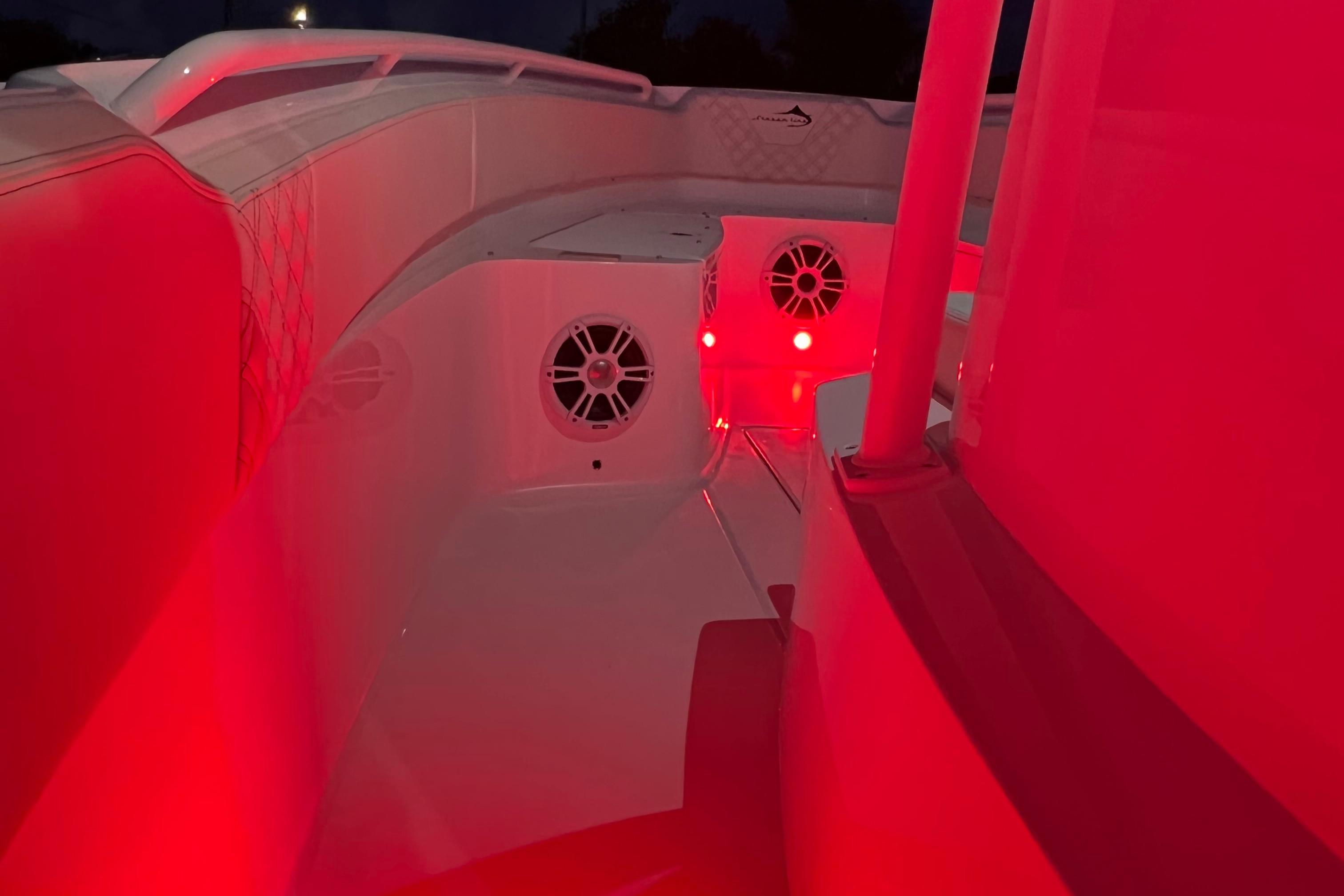 2022 Streamline 26TE boat interior with red LED lighting and speakers.
