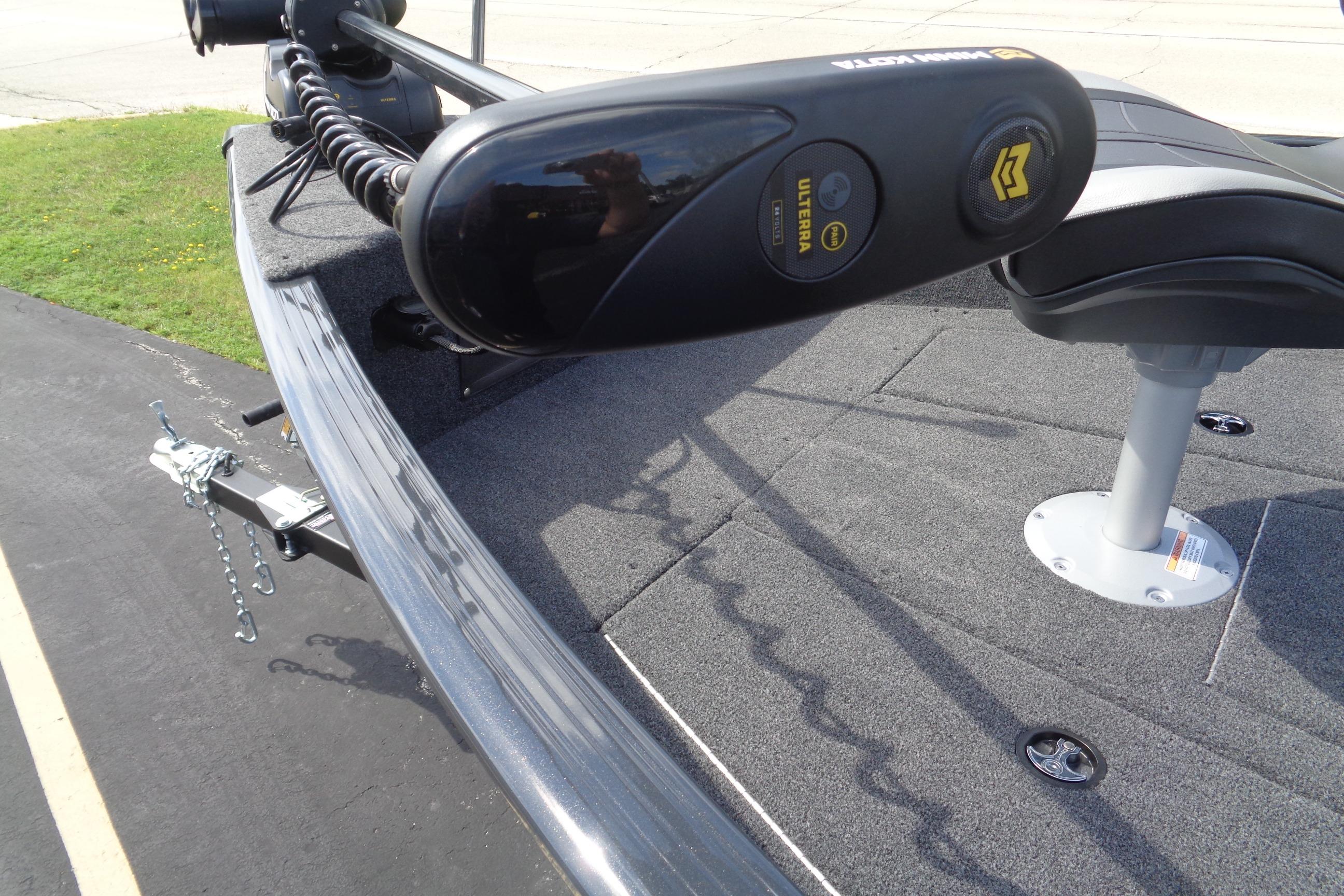2025 Lund 1675 Adventure SS boat deck with trolling motor and seat.