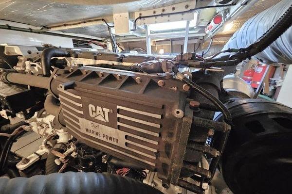 Engine room of 2005 Sunseeker Manhattan 66 yacht featuring CAT Marine Power engine.