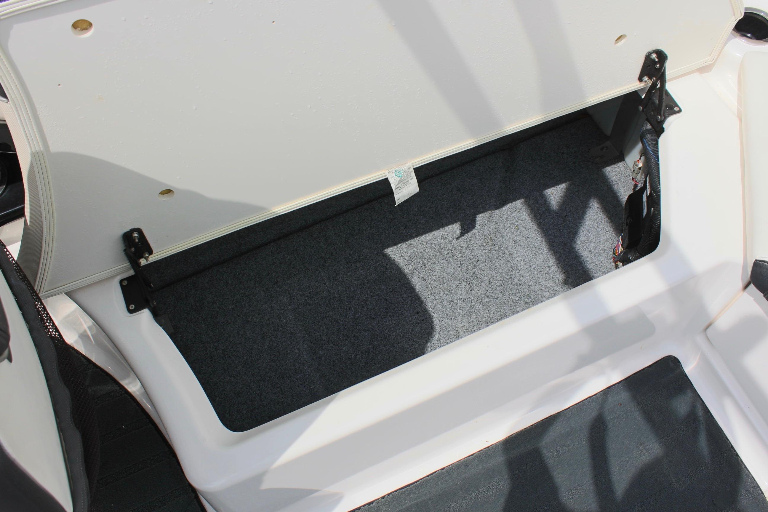 Open storage compartment on a 2016 Yamaha Boats 242 Limited S.