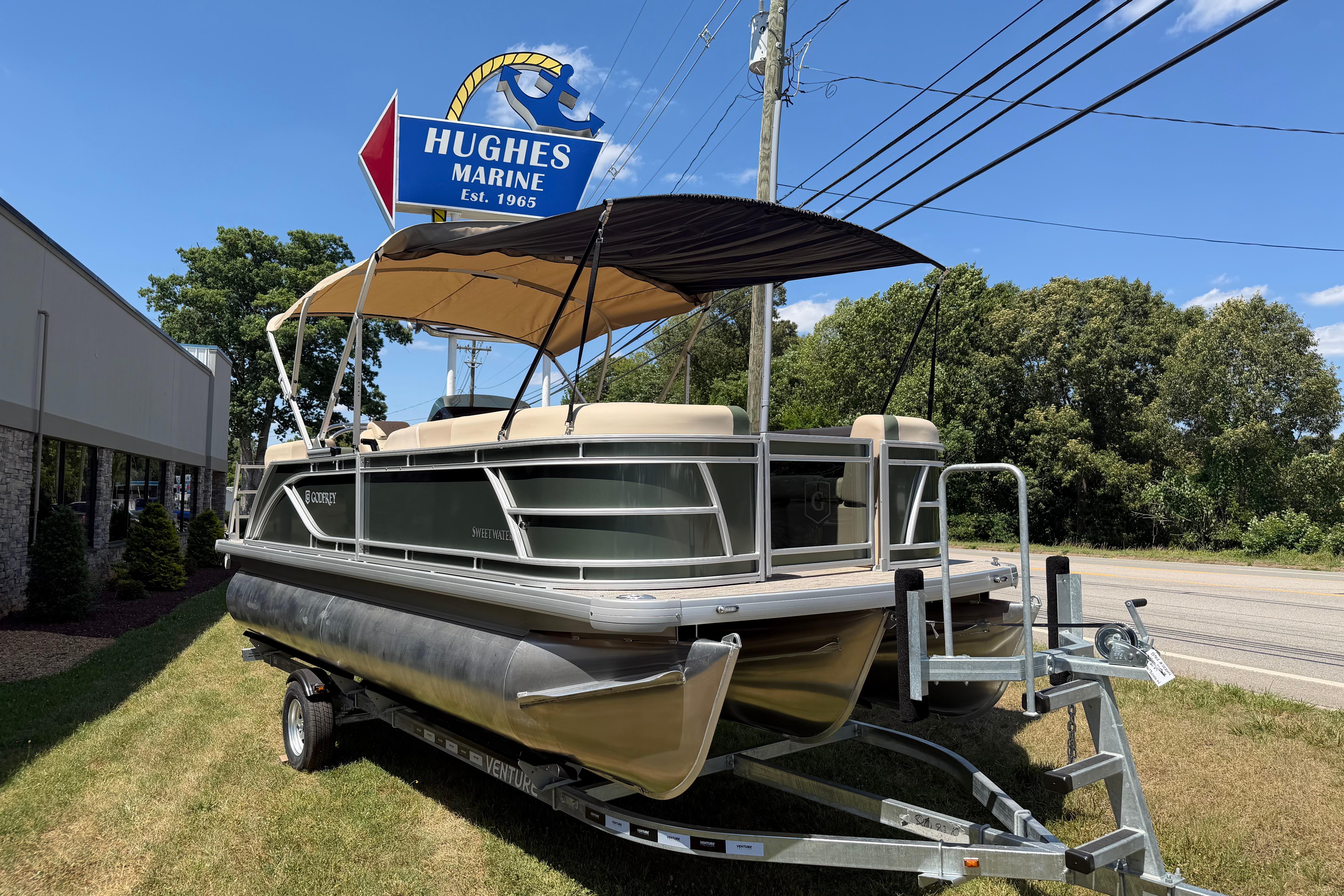 2026 Godfrey SW 2086 SBC pontoon boat displayed at Hughes Marine dealership.