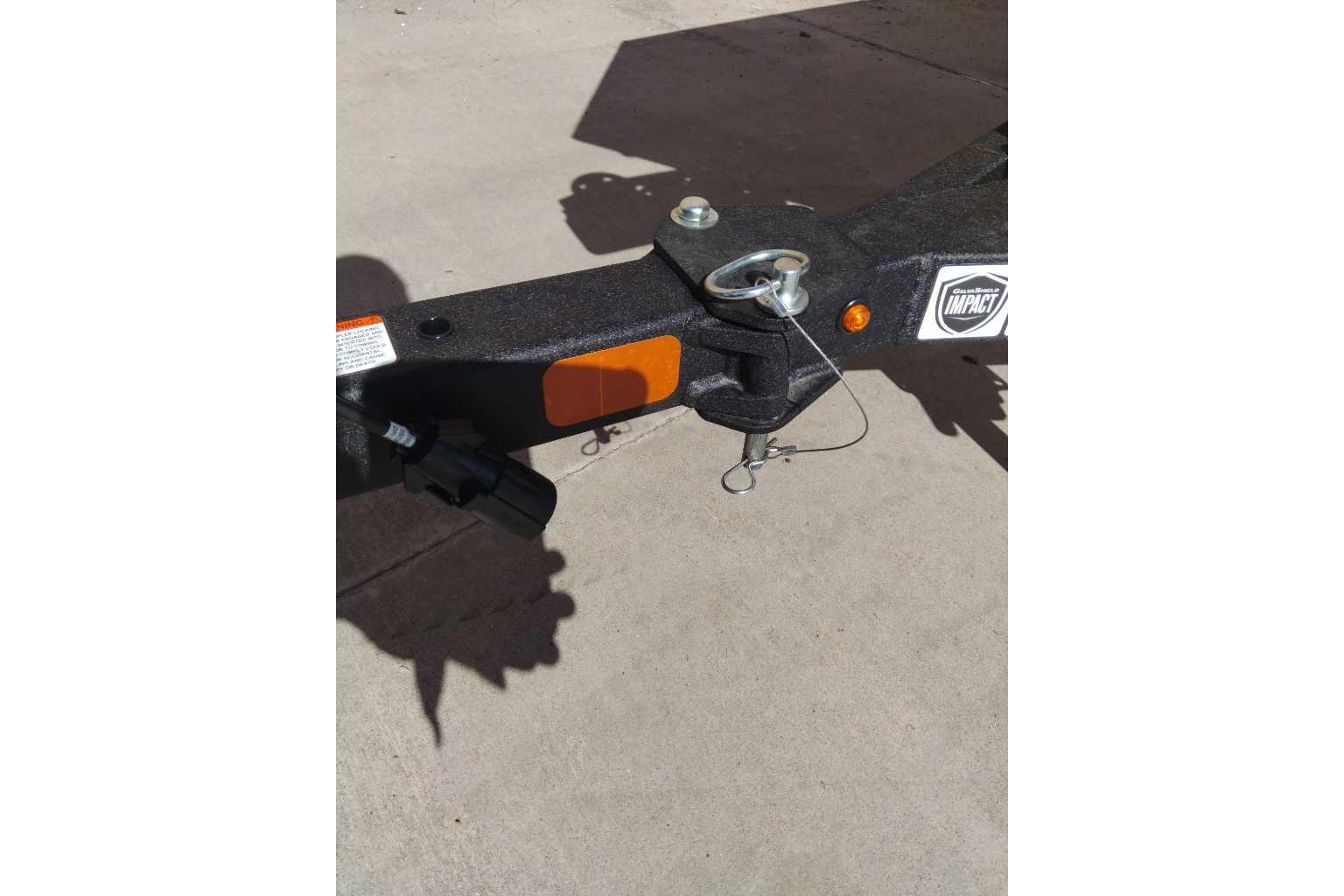 Trailer hitch of 2026 Tracker Pro 170 boat on concrete surface.