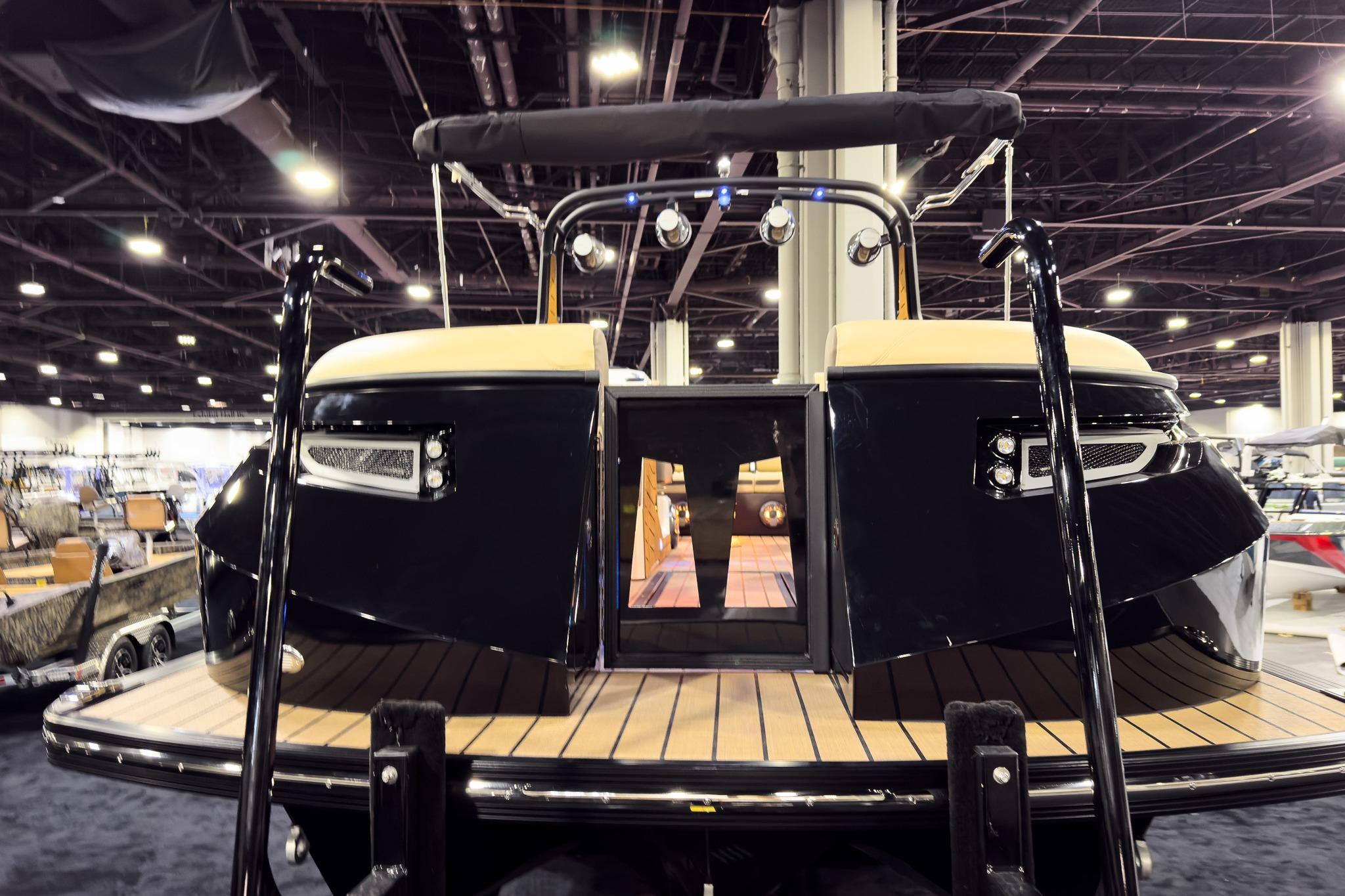 2026 Montara Surf Boss EVO SLDH 25' boat displayed at an indoor exhibition.