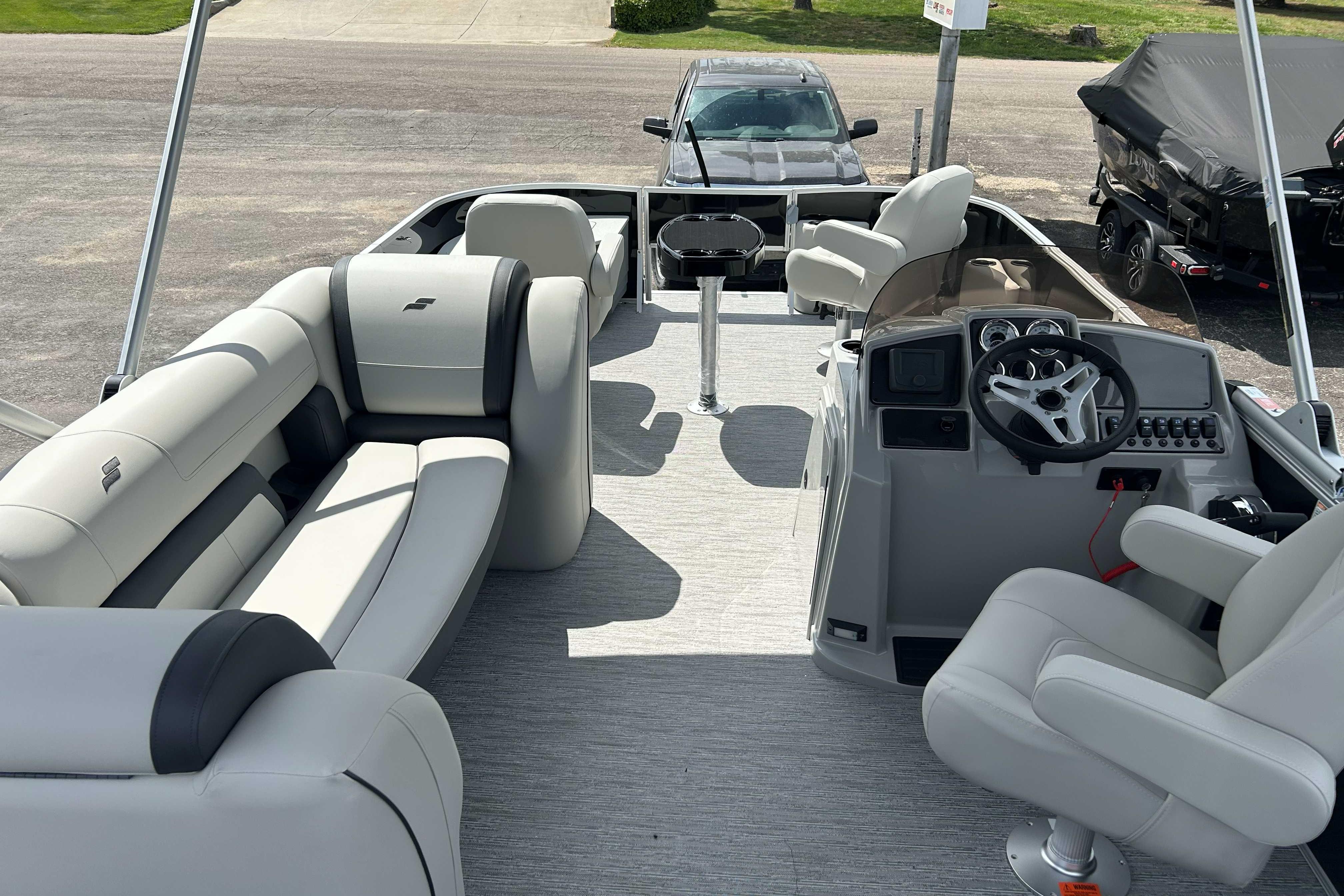 2026 Starcraft EX 22 FD pontoon boat interior with plush seating and modern helm.
