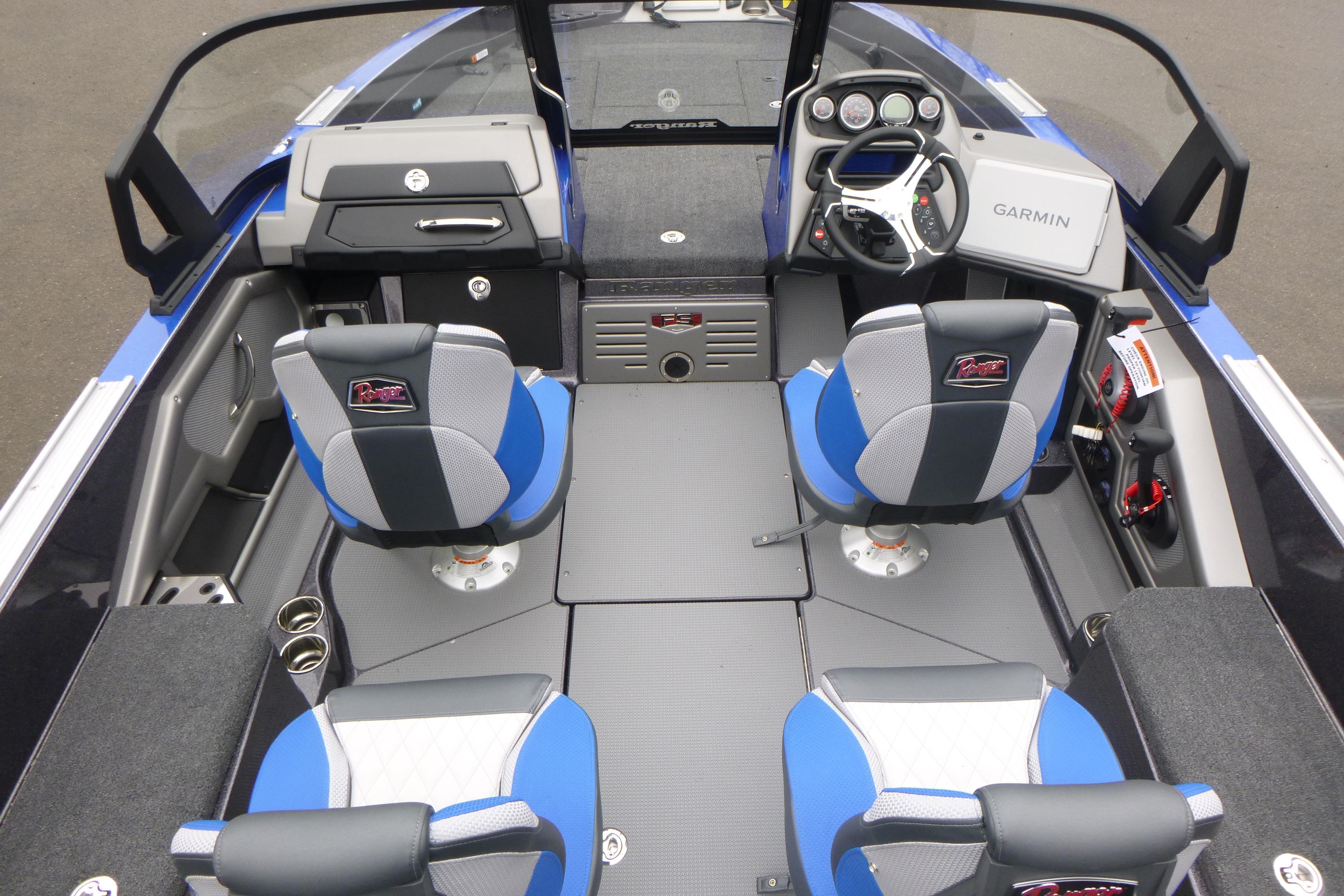 2026 Ranger 620FS Cup Equipped boat interior with blue seats and Garmin navigation.