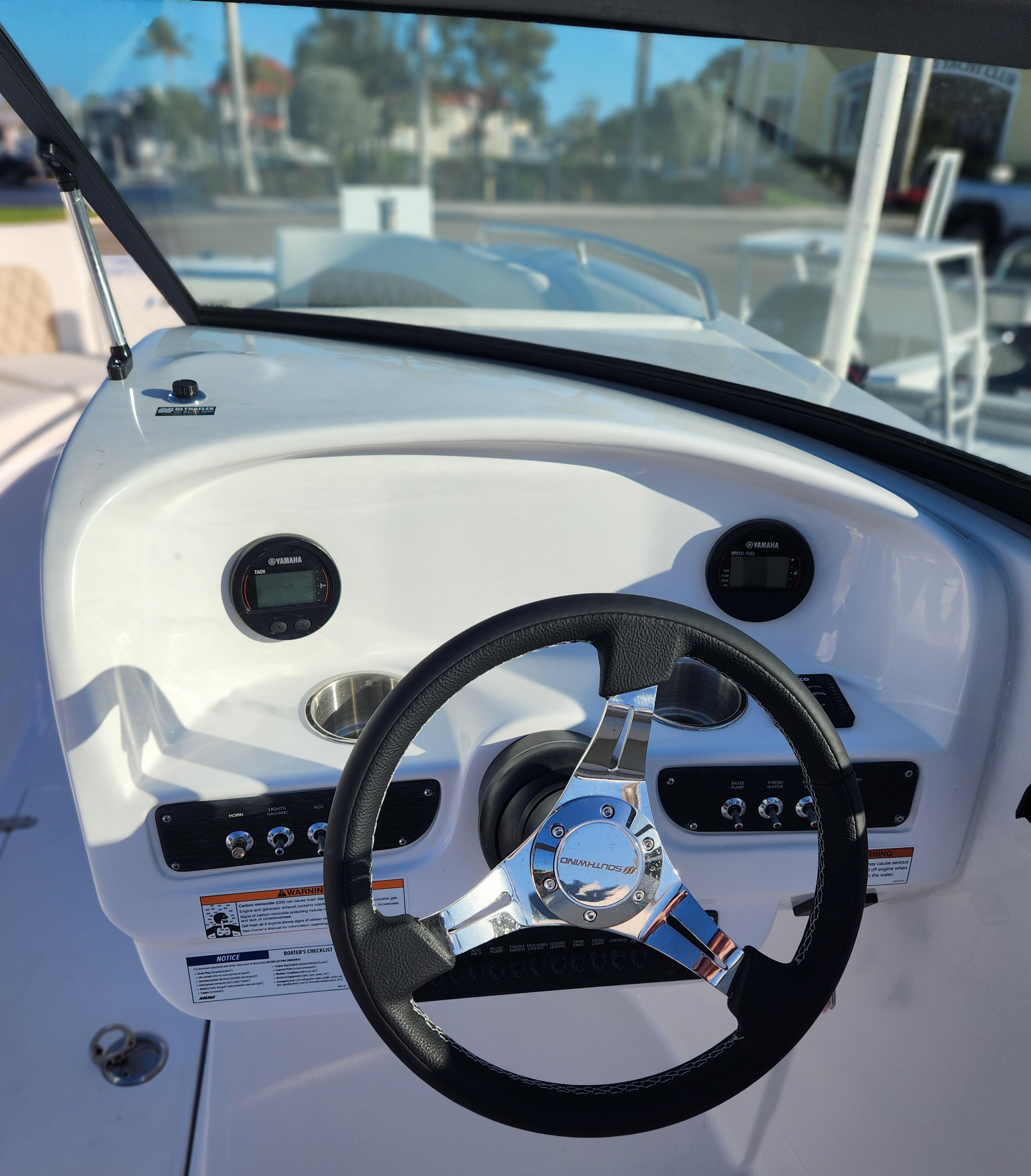 Steering wheel and dashboard of 2025 SouthWind 2600 SD boat.