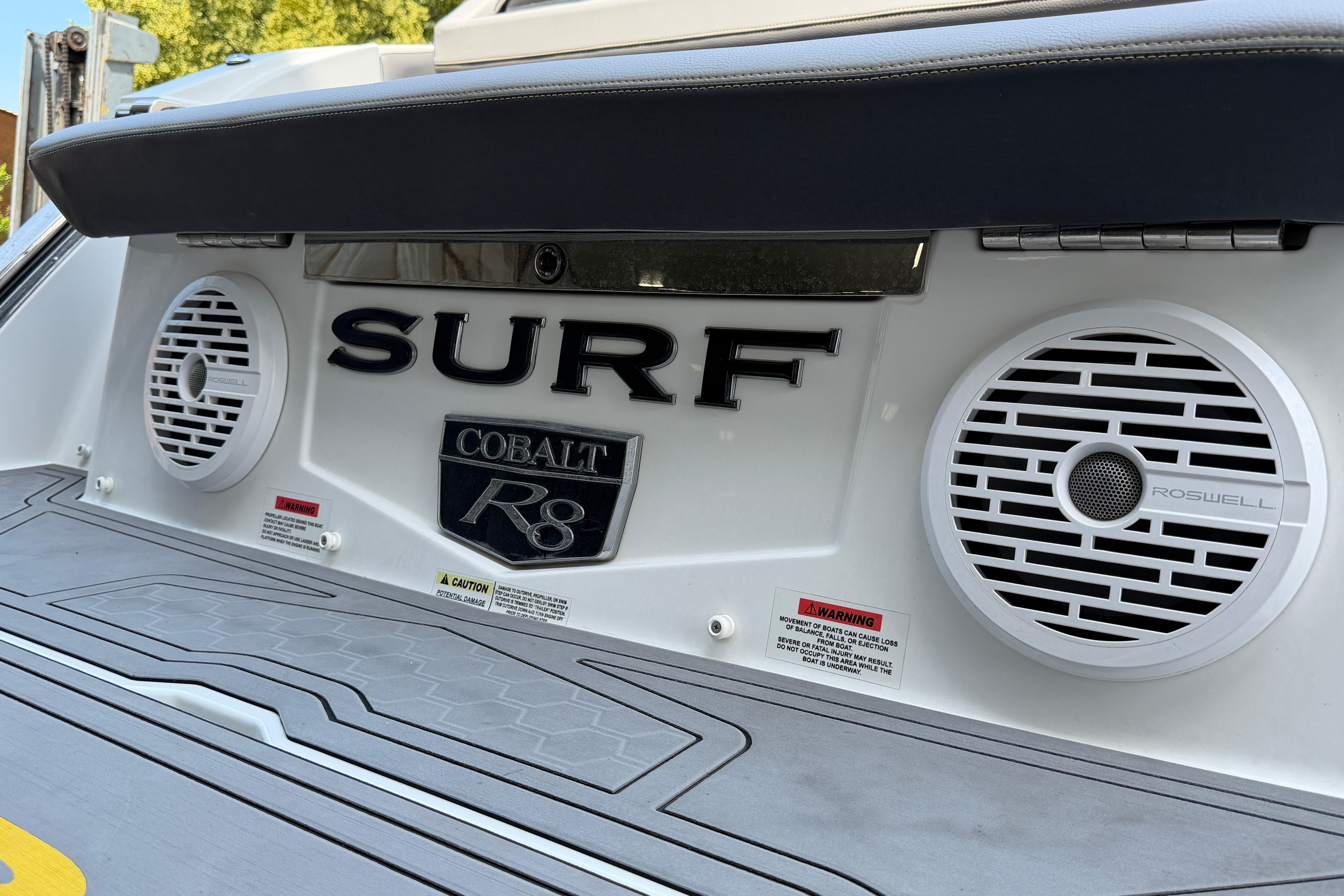 2021 Cobalt R8 Surf boat with Roswell speakers on the deck.