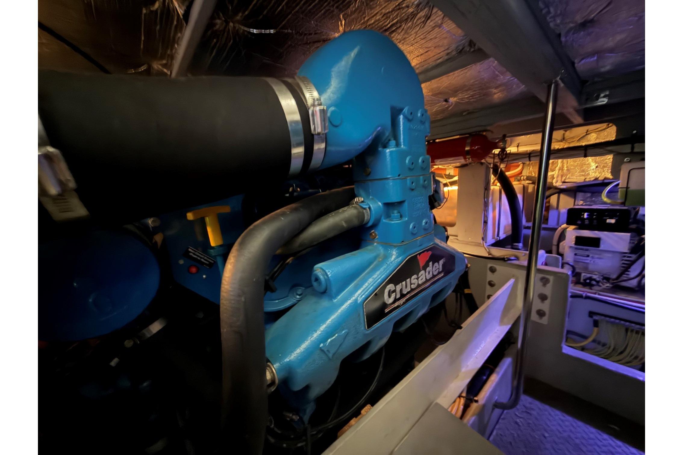 Engine room of 2004 Silverton 39 Motor Yacht featuring a Crusader engine.