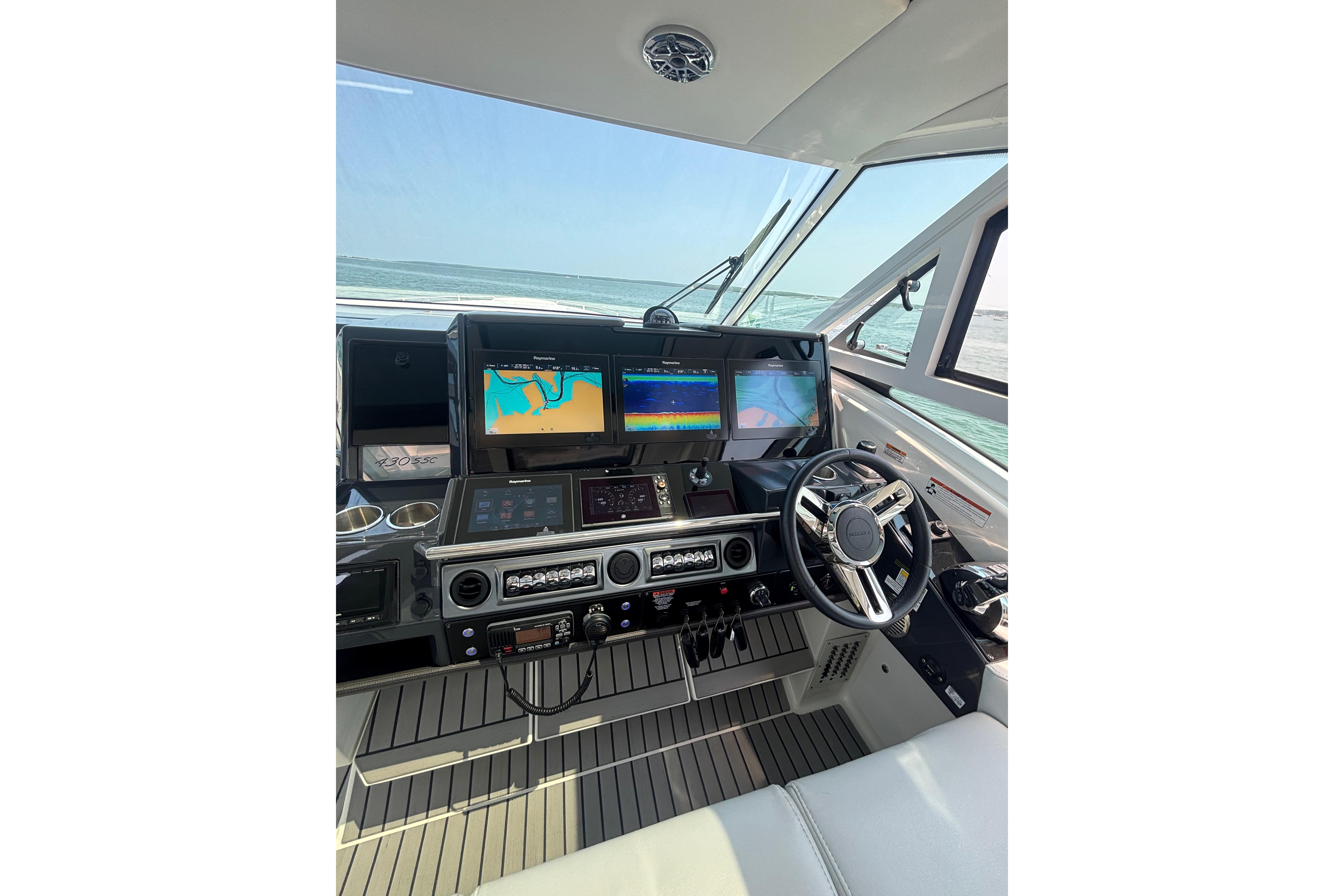Cockpit of 2019 Formula 430 Super Sport Crossover with advanced navigation displays.