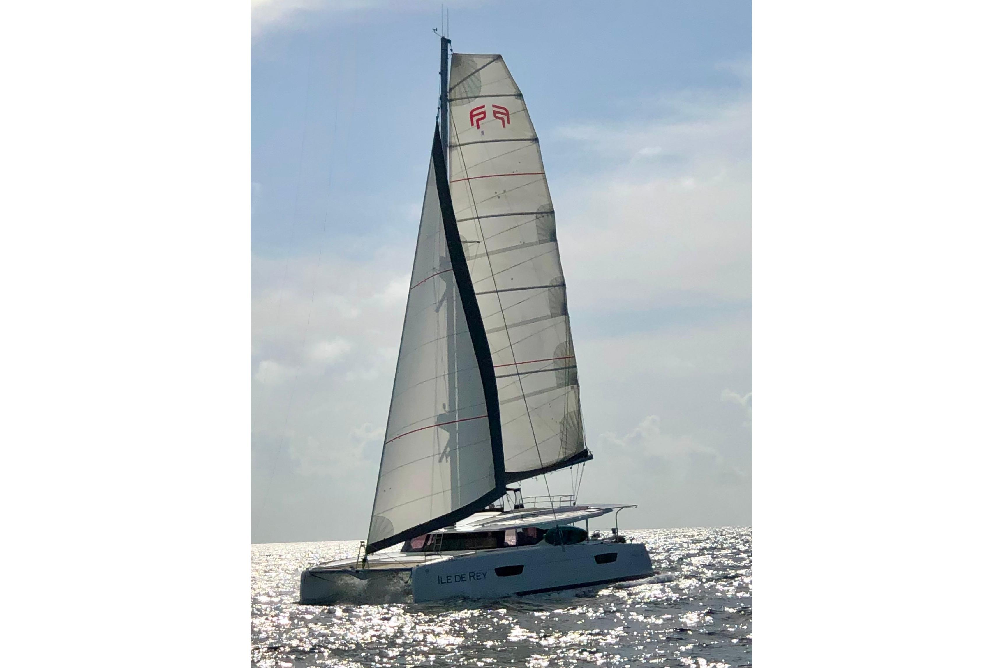 2020 Fountaine Pajot Saona 47 sailing on open water under clear skies.