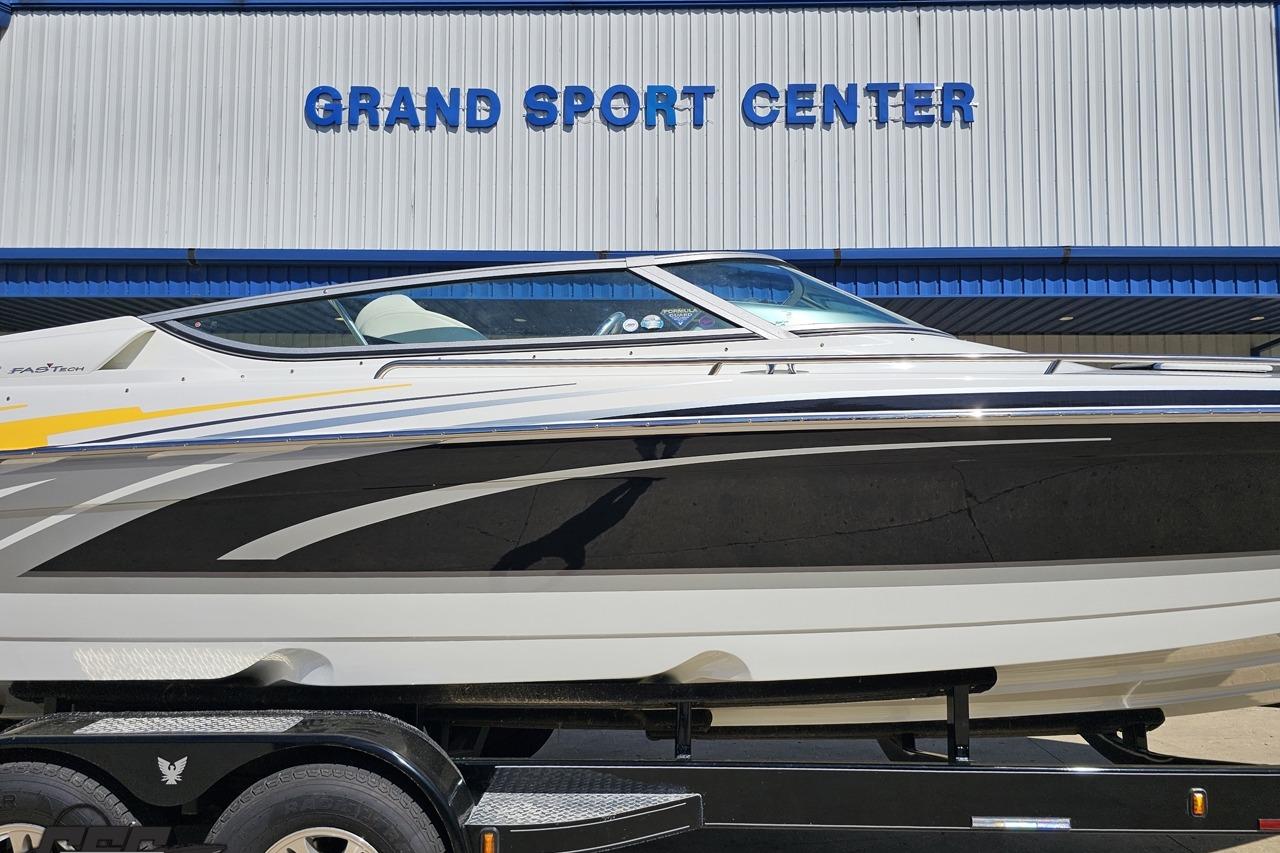 2014 Formula 292 FASTech boat at Grand Sport Center, sleek design on trailer.