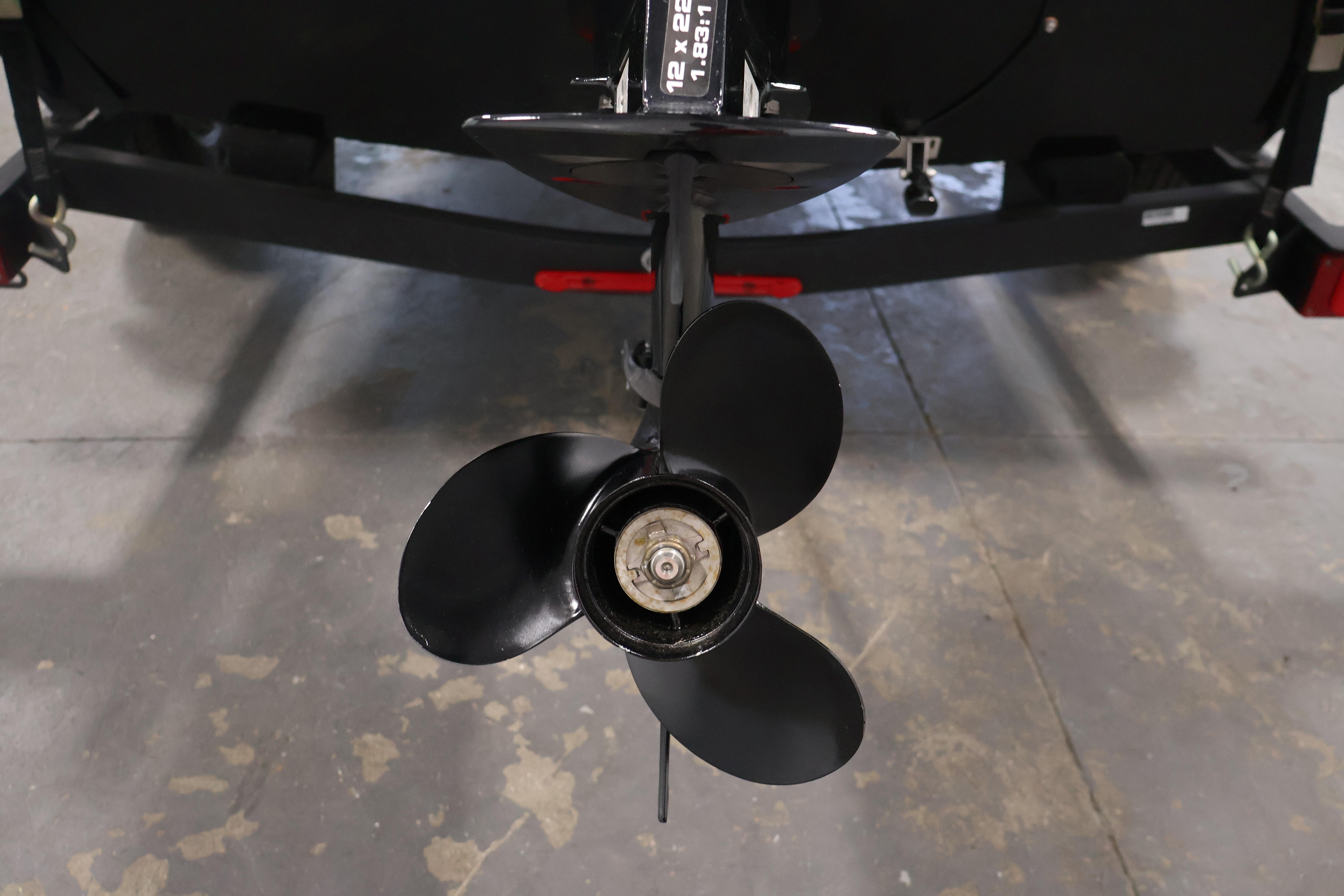 2024 Tracker Pro 170 boat propeller on a trailer in a garage setting.