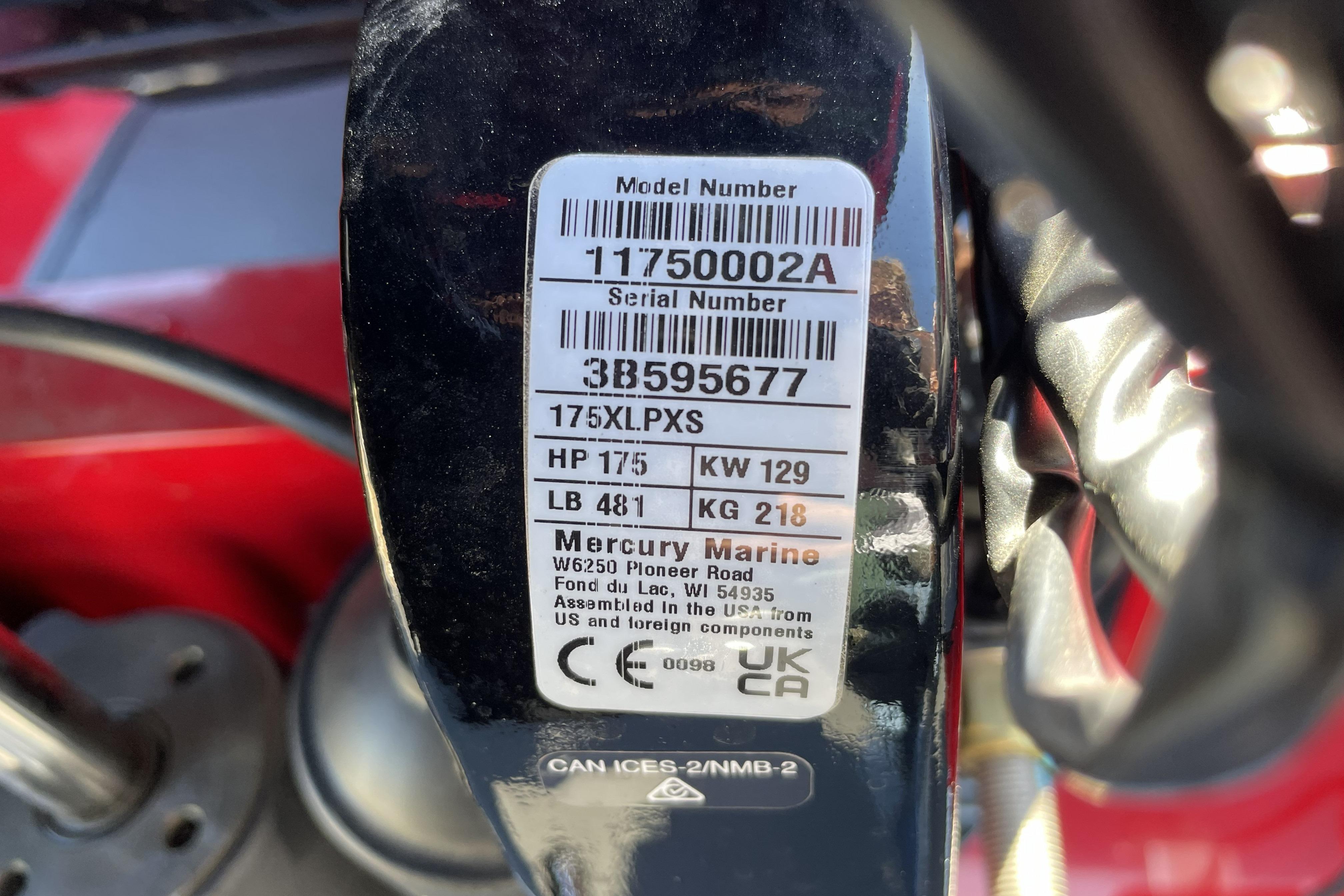 Label on a 2026 Tracker Targa V-18 WT boat engine, showing model and serial numbers.