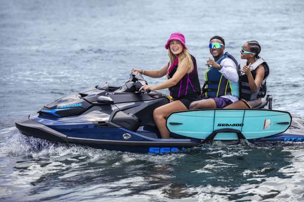 Manufacturer Provided Image: Three people enjoying a ride on a 2026 Sea-Doo GTX 230 jet ski.