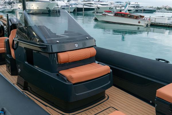 2024 Onda Magna luxury boat with sleek design and leather seating at a marina.