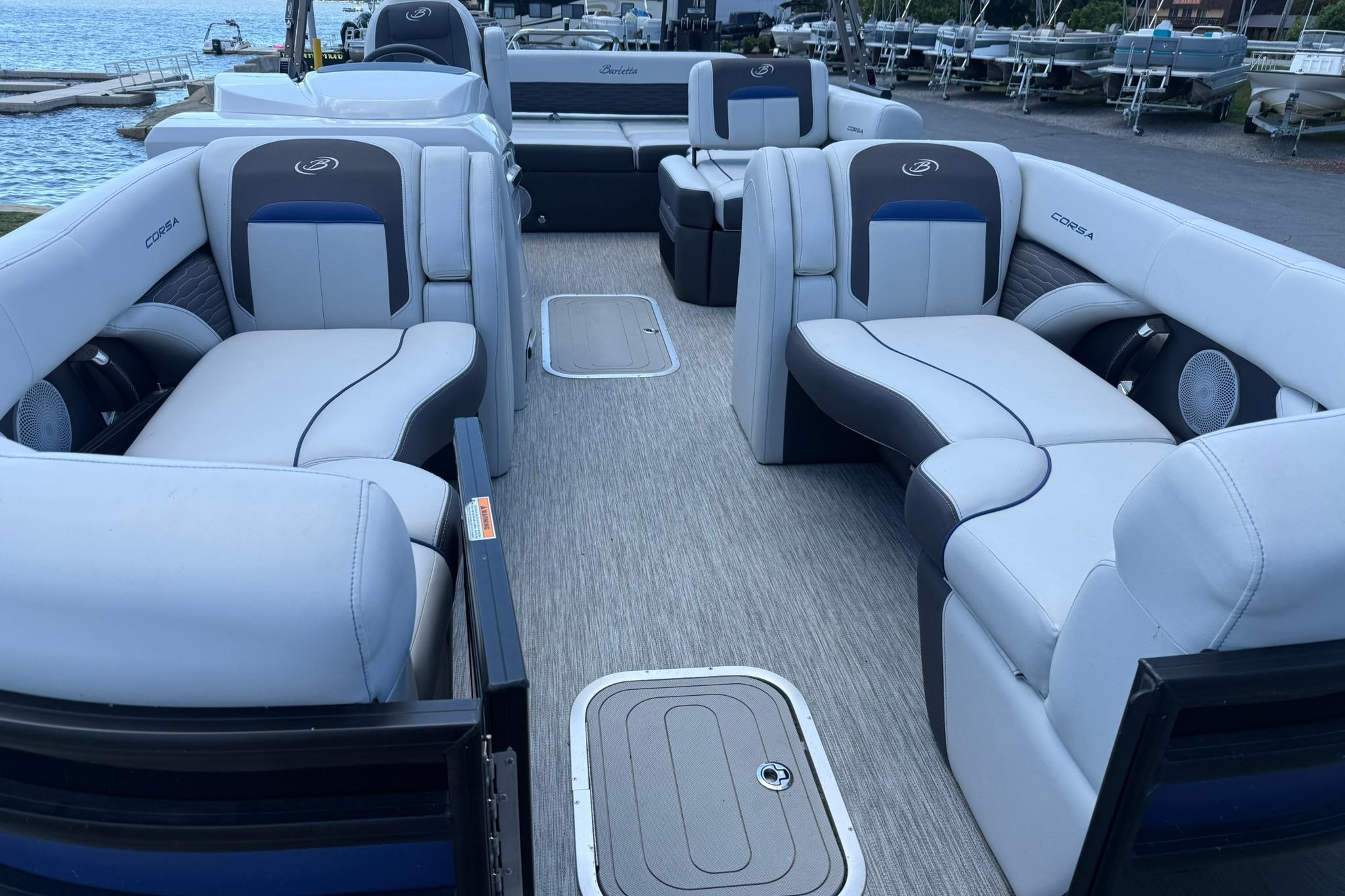 2023 Barletta Corsa 23U pontoon boat with luxurious seating and modern design.