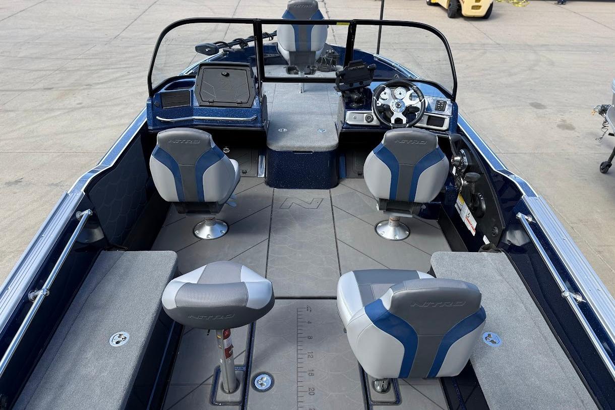 Interior of a 2026 Nitro ZV21 Pro boat with seating and steering console.