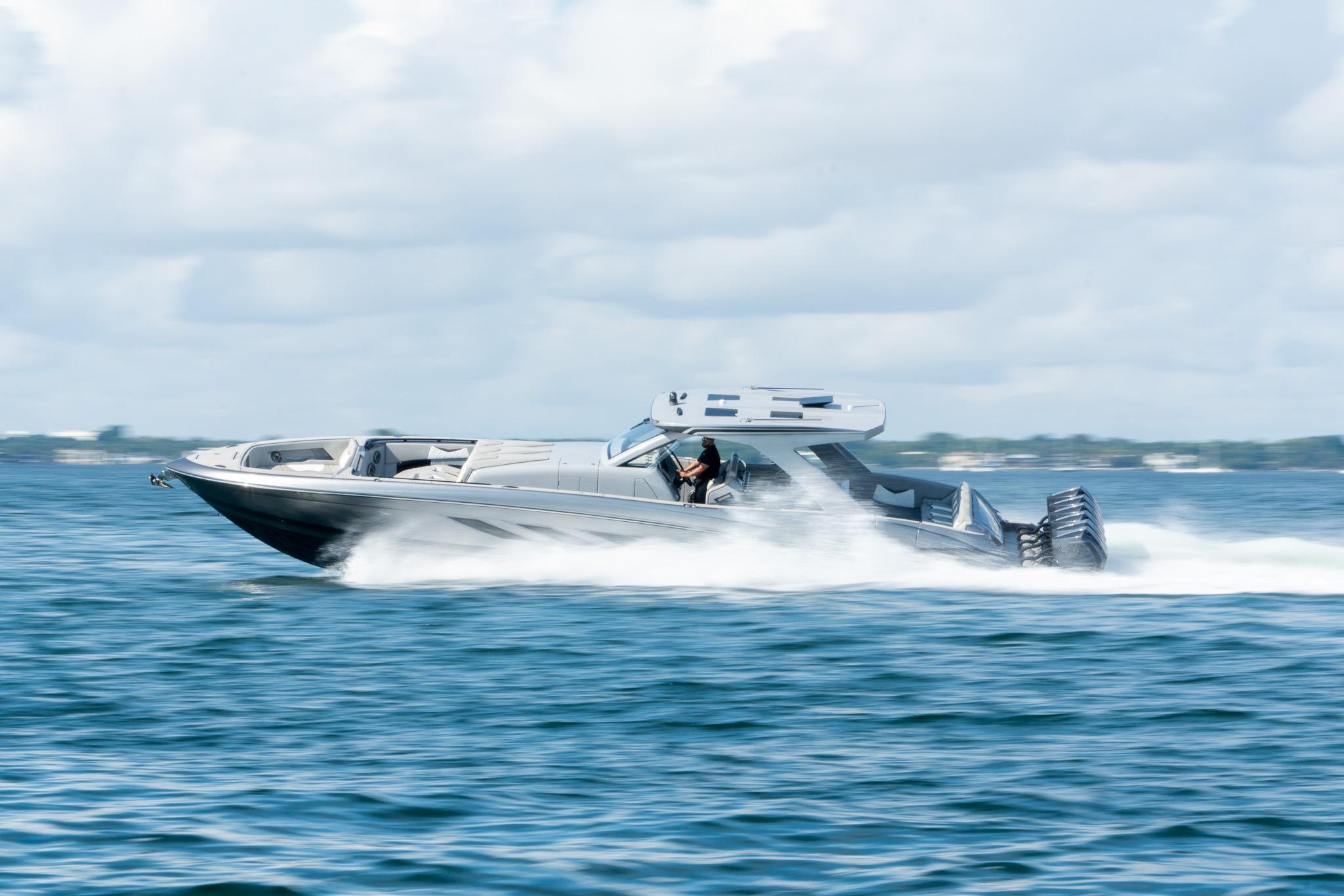 2026 Deep Impact 499 Sport boat speeding on open water.