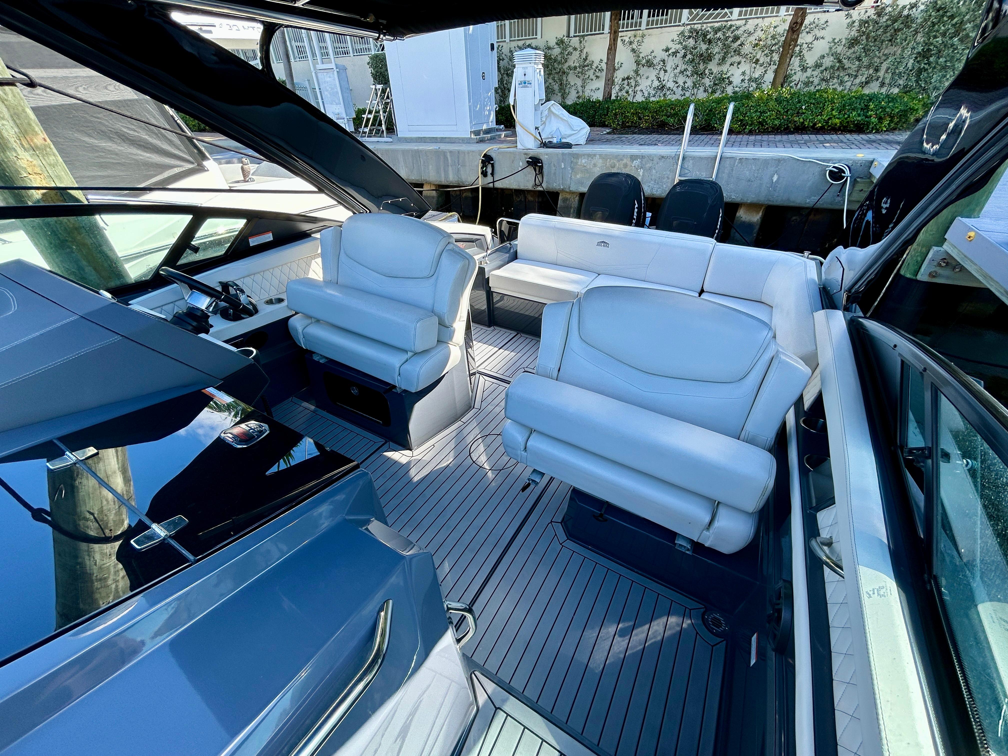 2021 Cruisers Yachts 338 South Beach Edition Bow Rider interior with luxurious seating and sleek design.