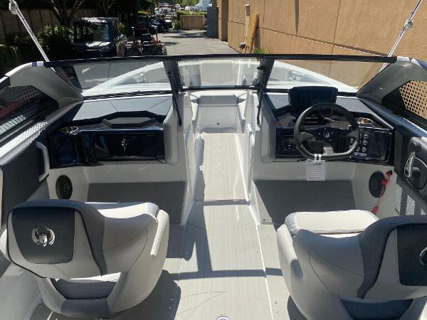 2025 Scarab 235 SE boat interior with modern dashboard and seating.